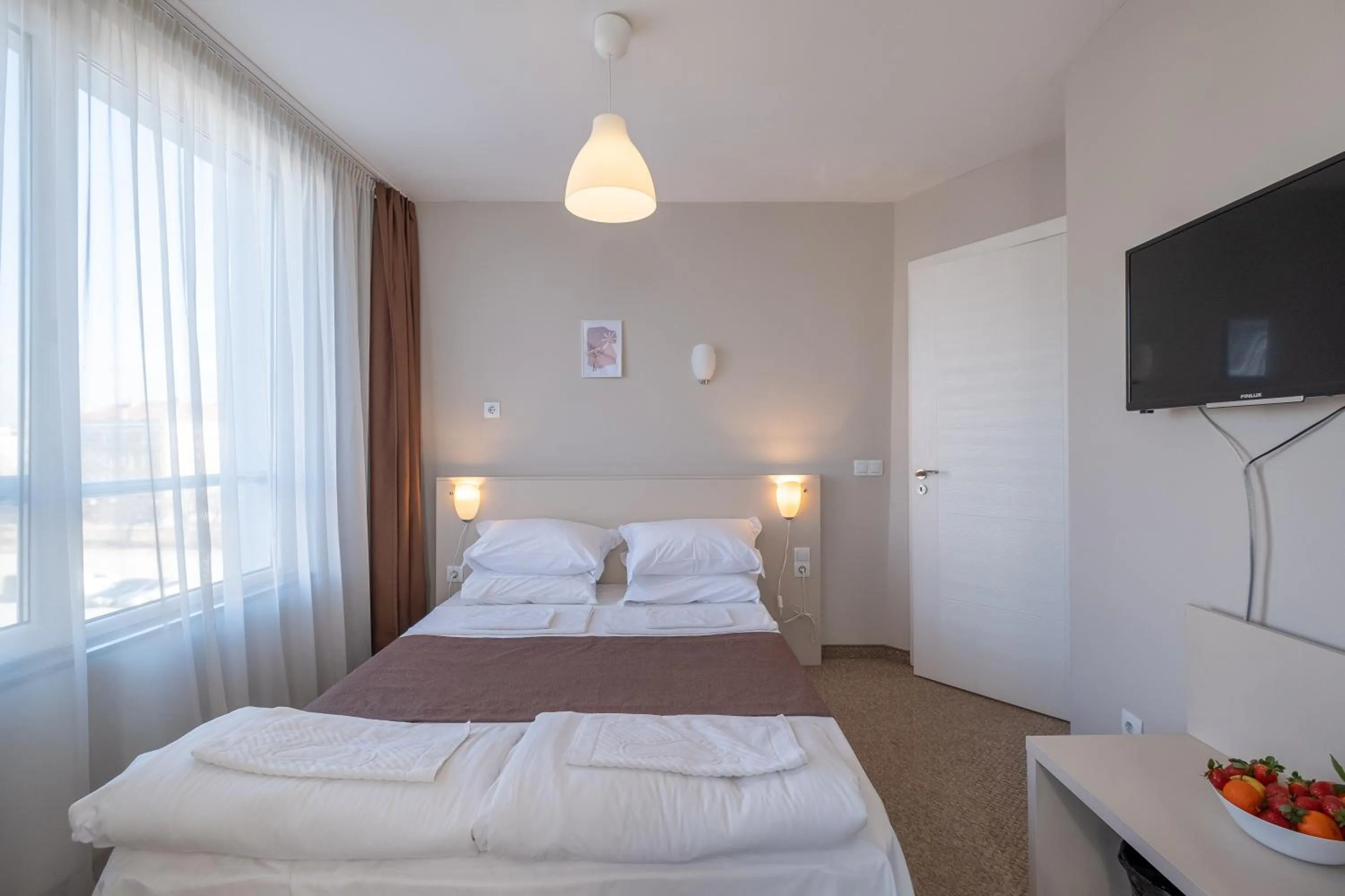 Photo of the whole room, Bed in Blue Label Apart House