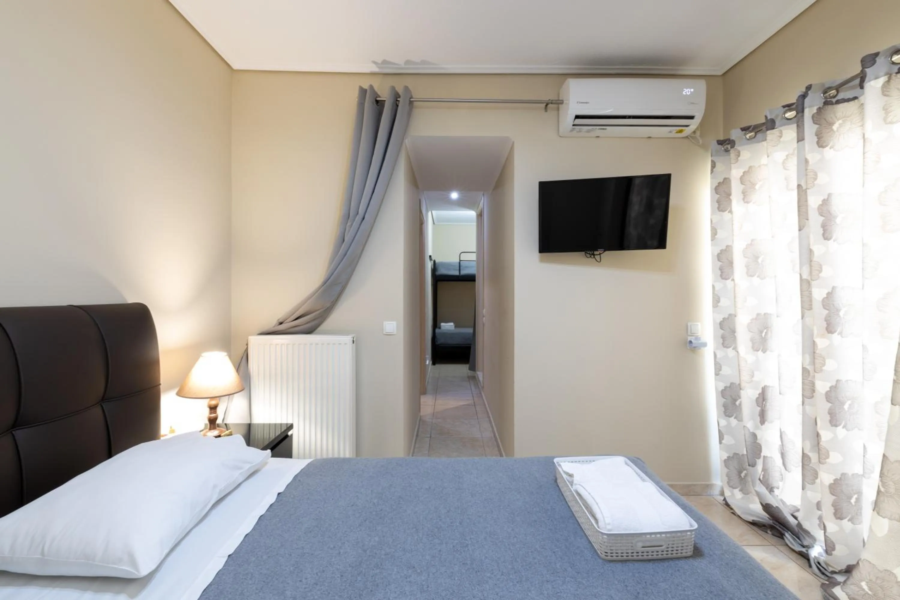 TV and multimedia, Bed in A&J Apartments or Rooms athens airport