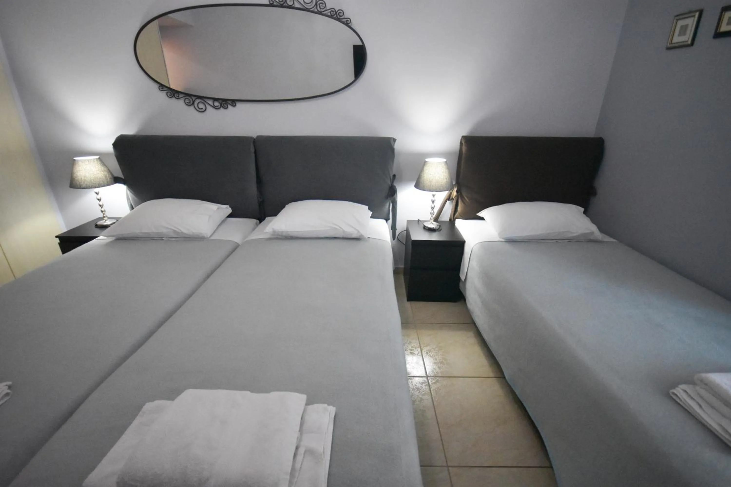 Bedroom, Bed in A&J Apartments or Rooms athens airport
