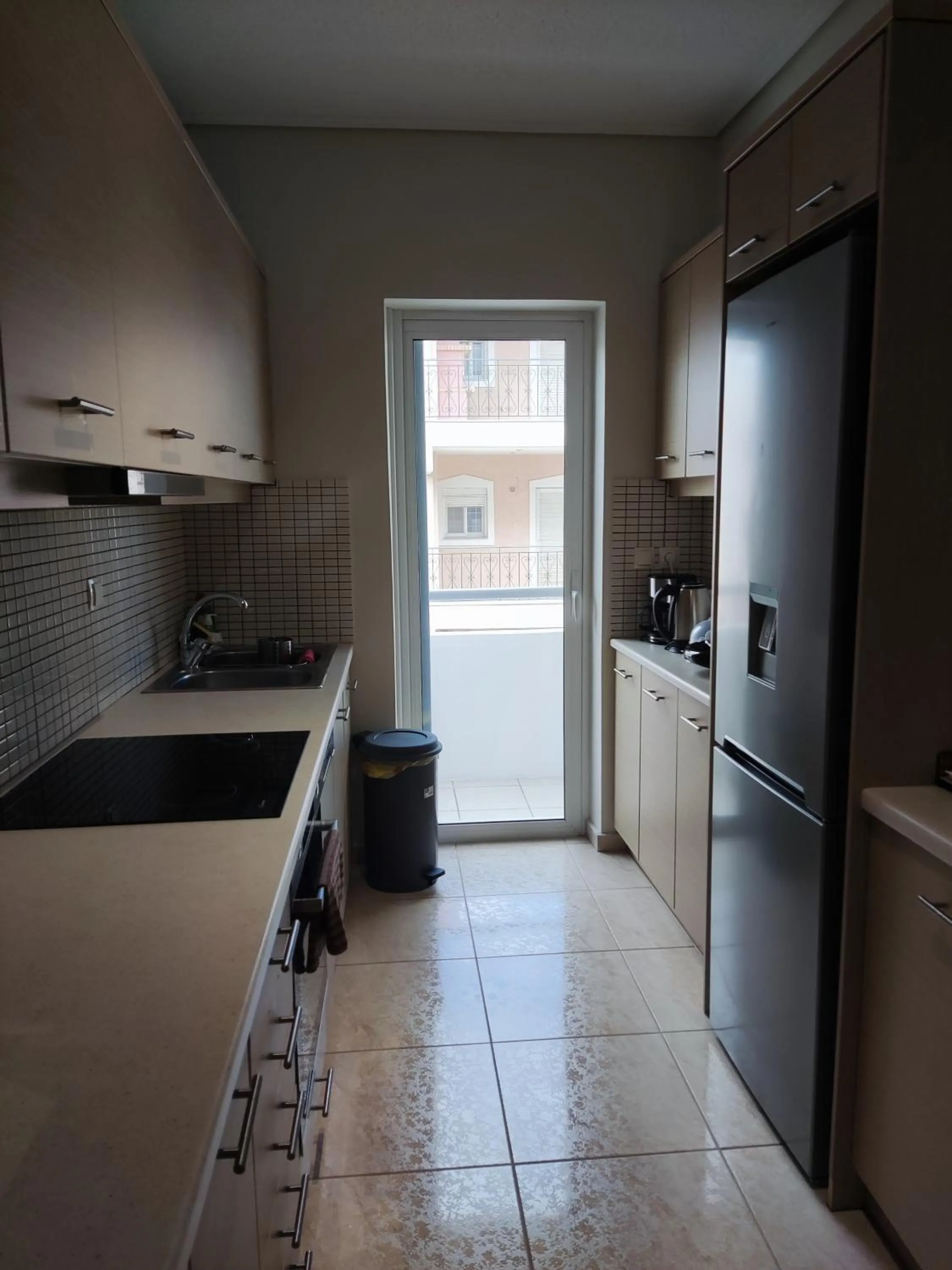 Kitchen or kitchenette in A&J Apartments or Rooms athens airport
