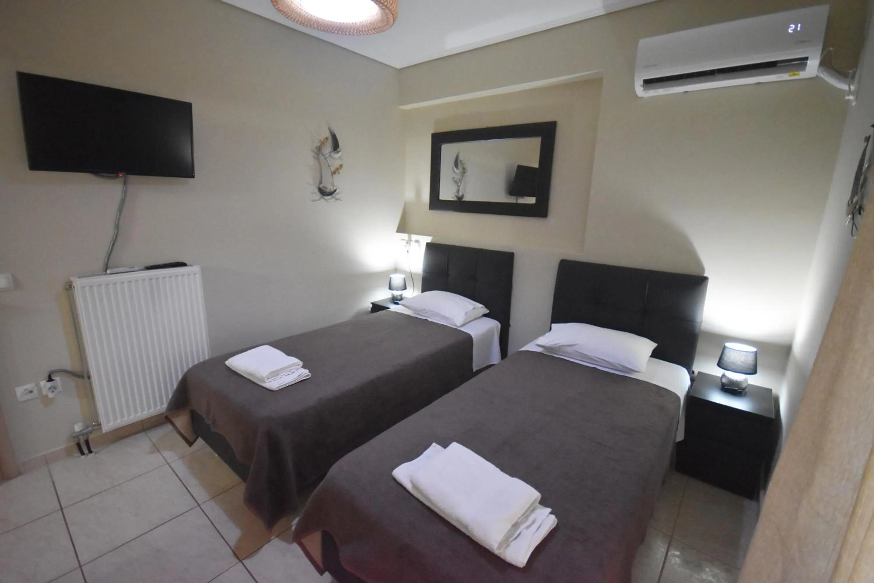Bedroom, Bed in A&J Apartments or Rooms athens airport
