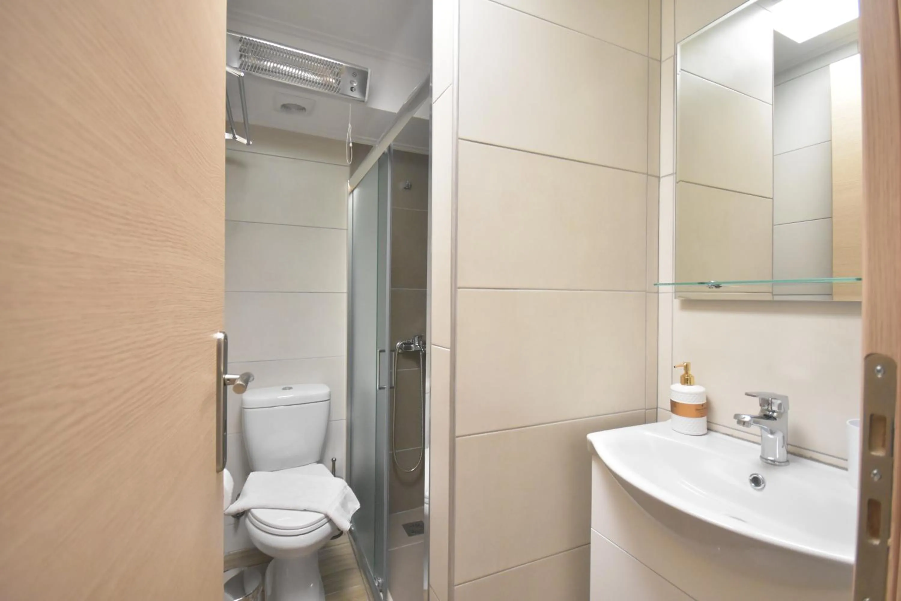 Shower in A&J Apartments or Rooms athens airport