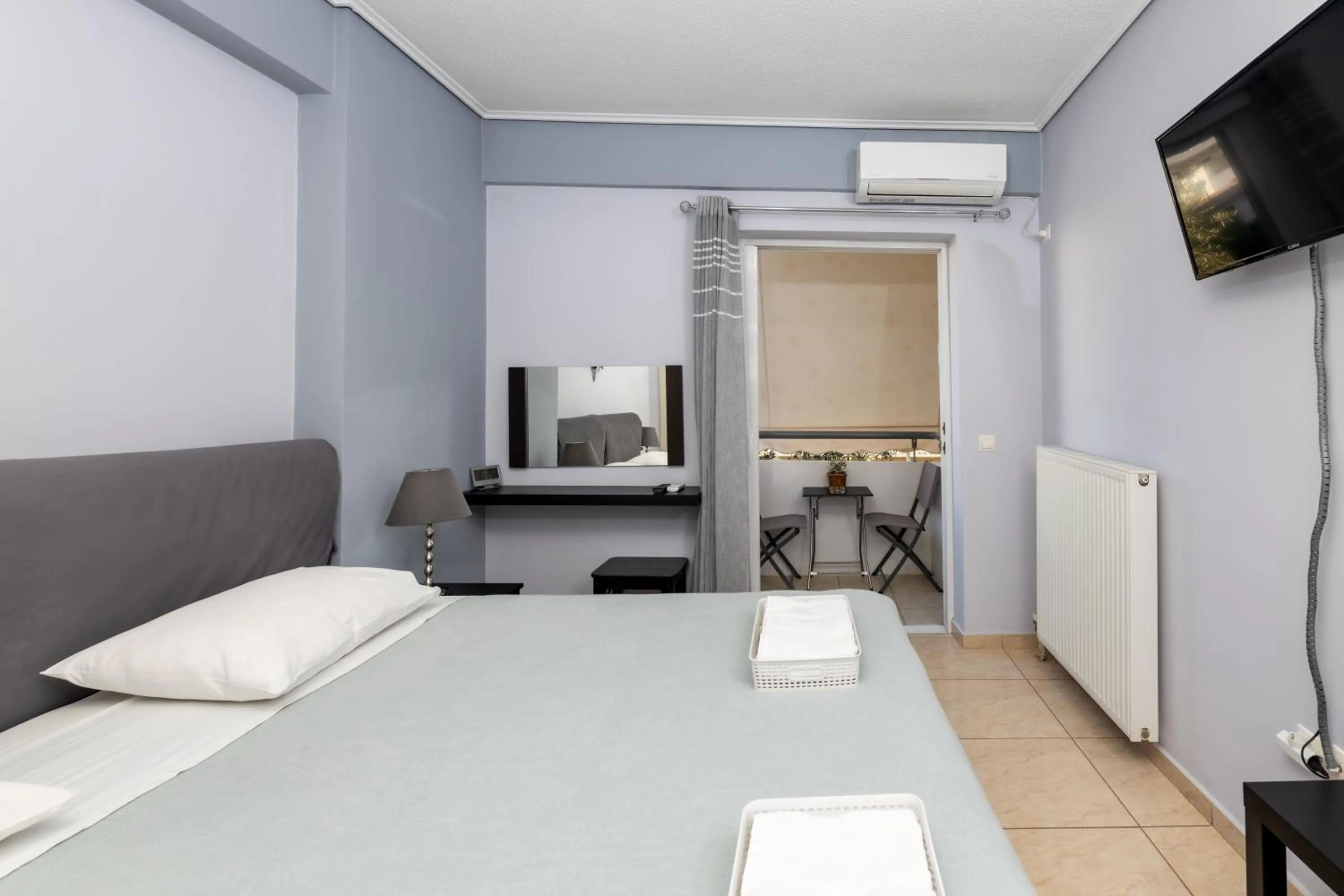 TV and multimedia, Bed in A&J Apartments or Rooms athens airport