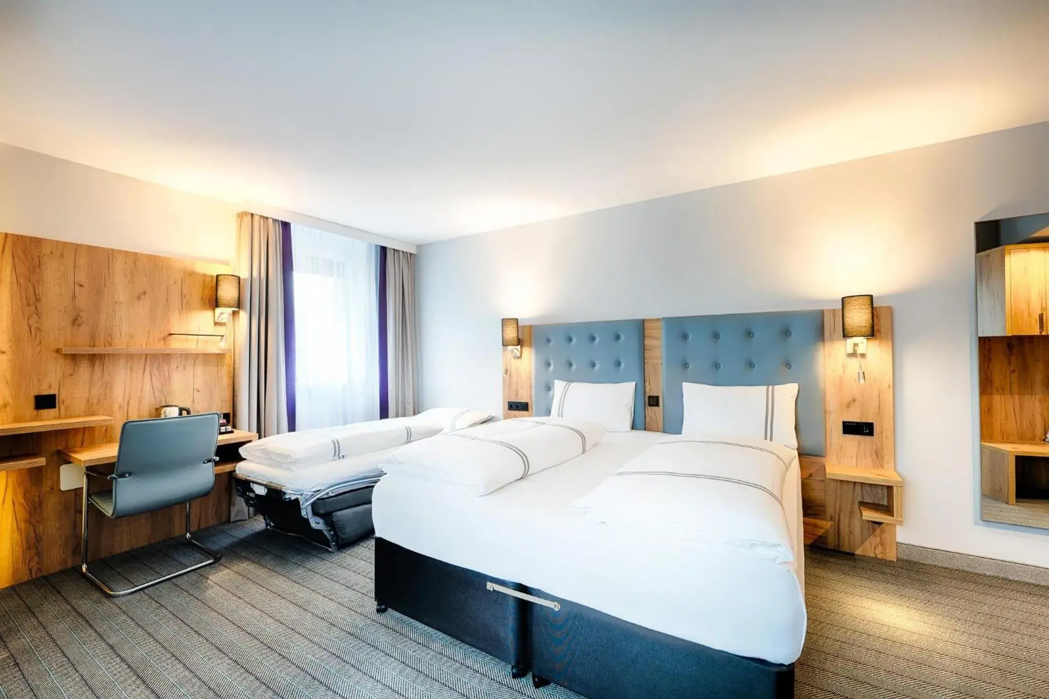 Standard Triple Room in Premier Inn Lindau Standard Triple Room in Premier Inn Lindau