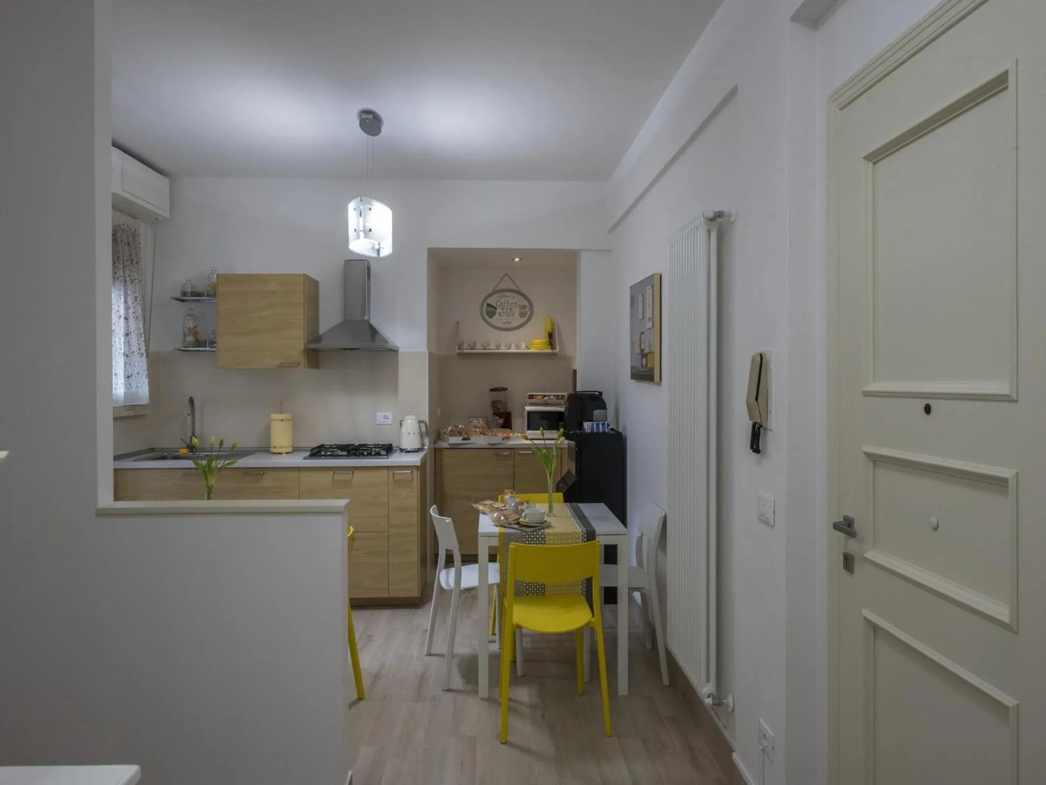 Communal lounge/ TV room in Affittacamere Le Quattro Stagioni