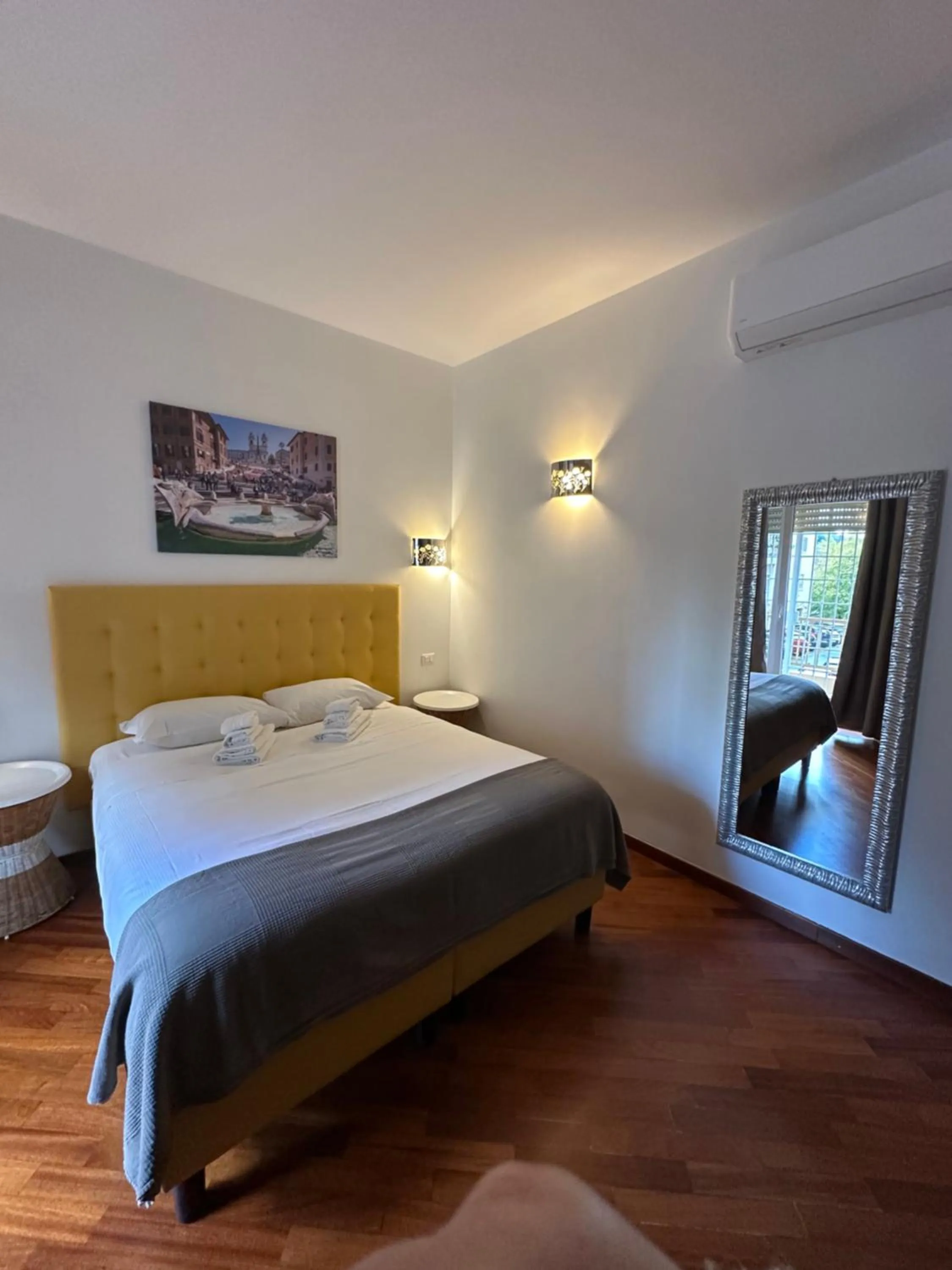 Bed in Vatican QG Rooms