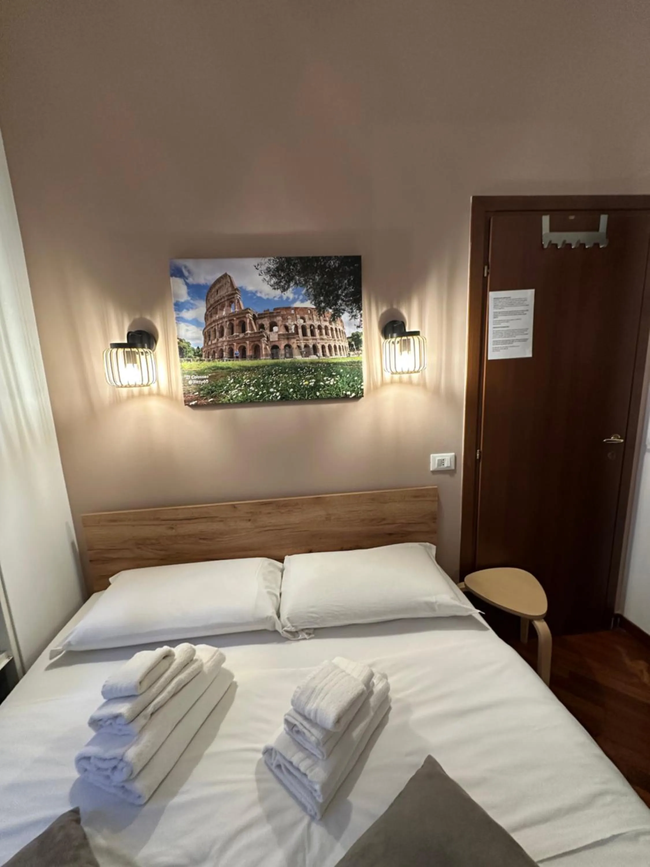 Bed in Vatican QG Rooms