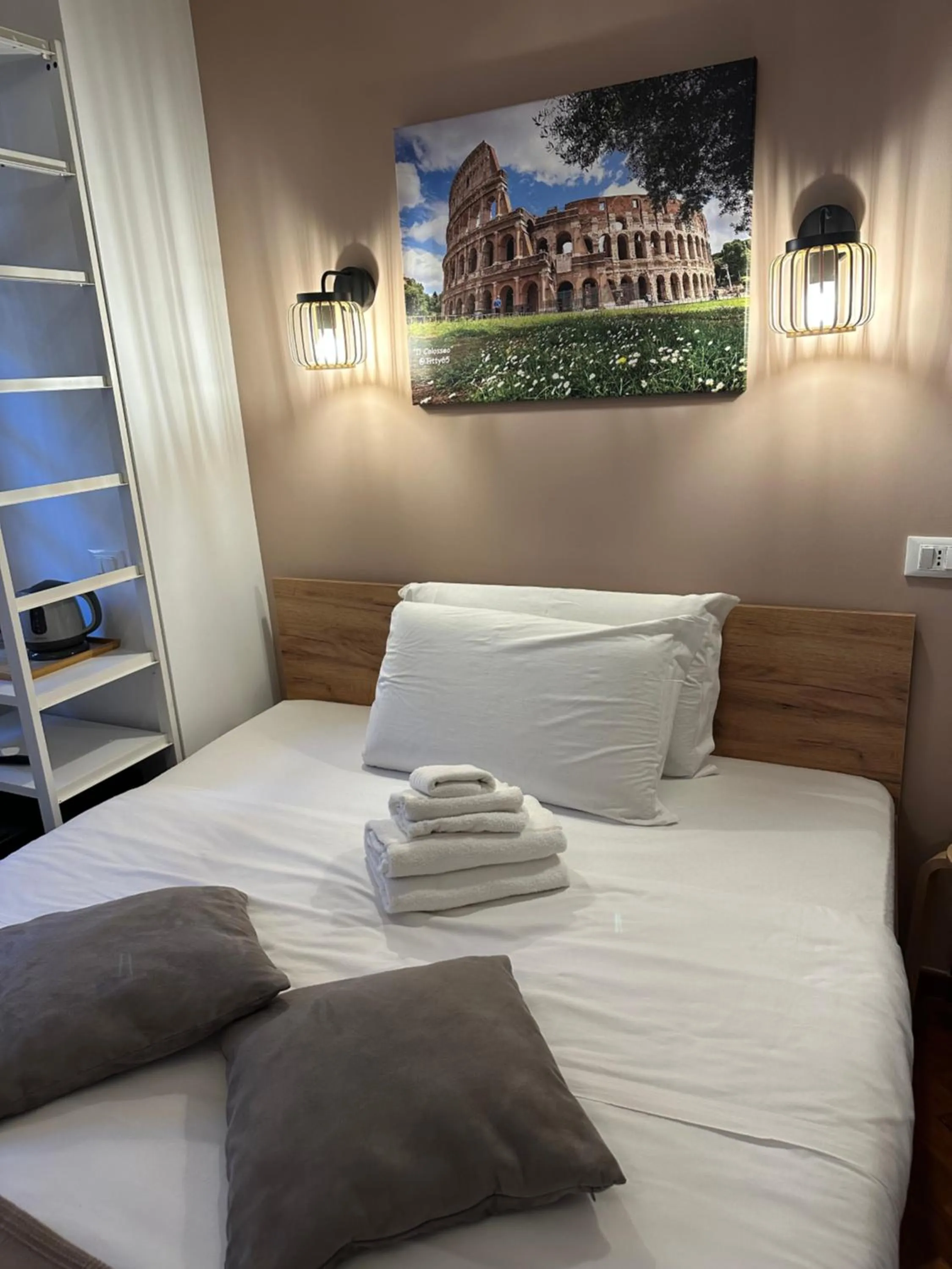 Bed in Vatican QG Rooms