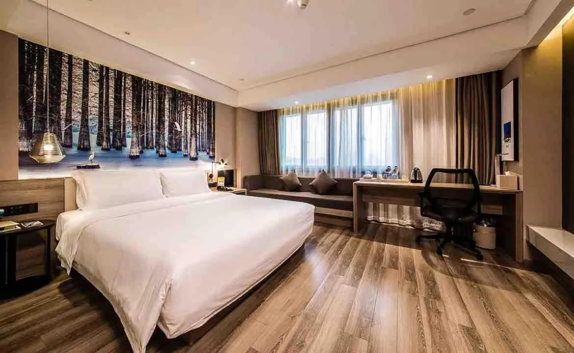 Bed in Ningbo Tianyi Square Atour Hotel