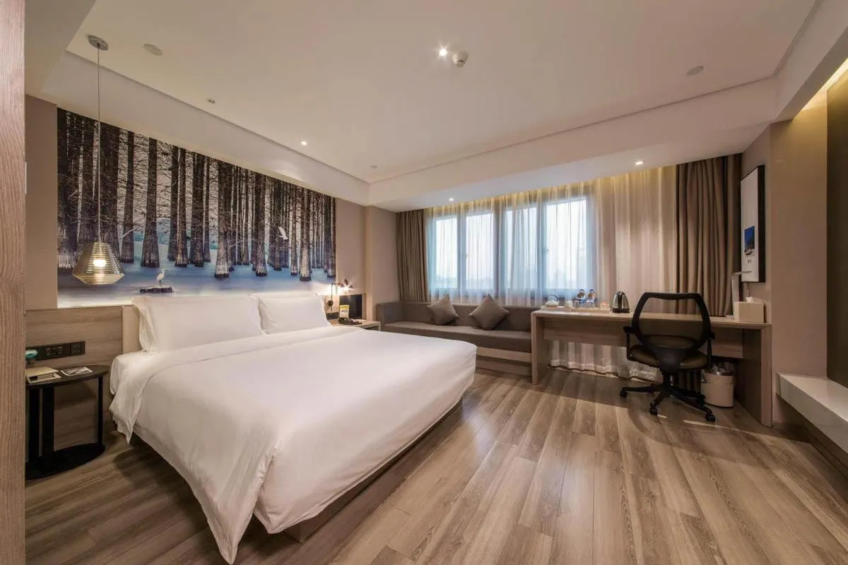 Bed in Ningbo Tianyi Square Atour Hotel
