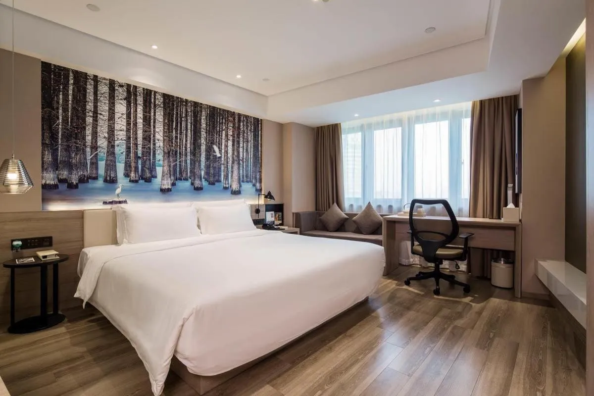 Bed in Ningbo Tianyi Square Atour Hotel