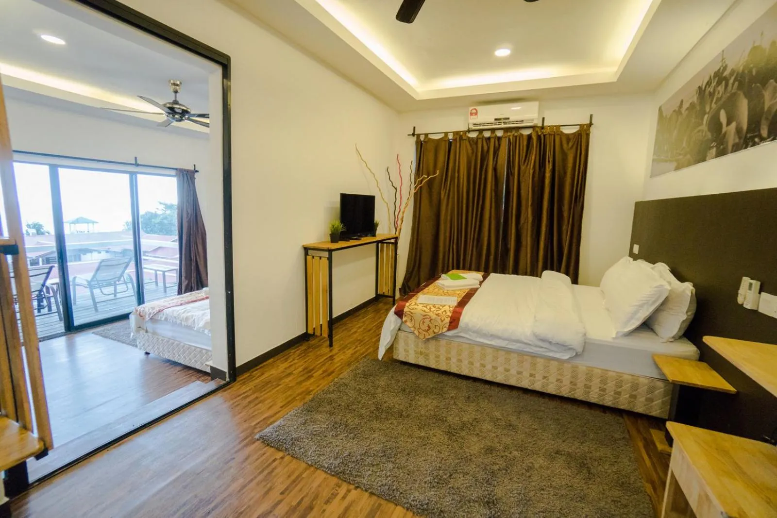 Photo of the whole room, Bed in The Barat Tioman Beach Resort