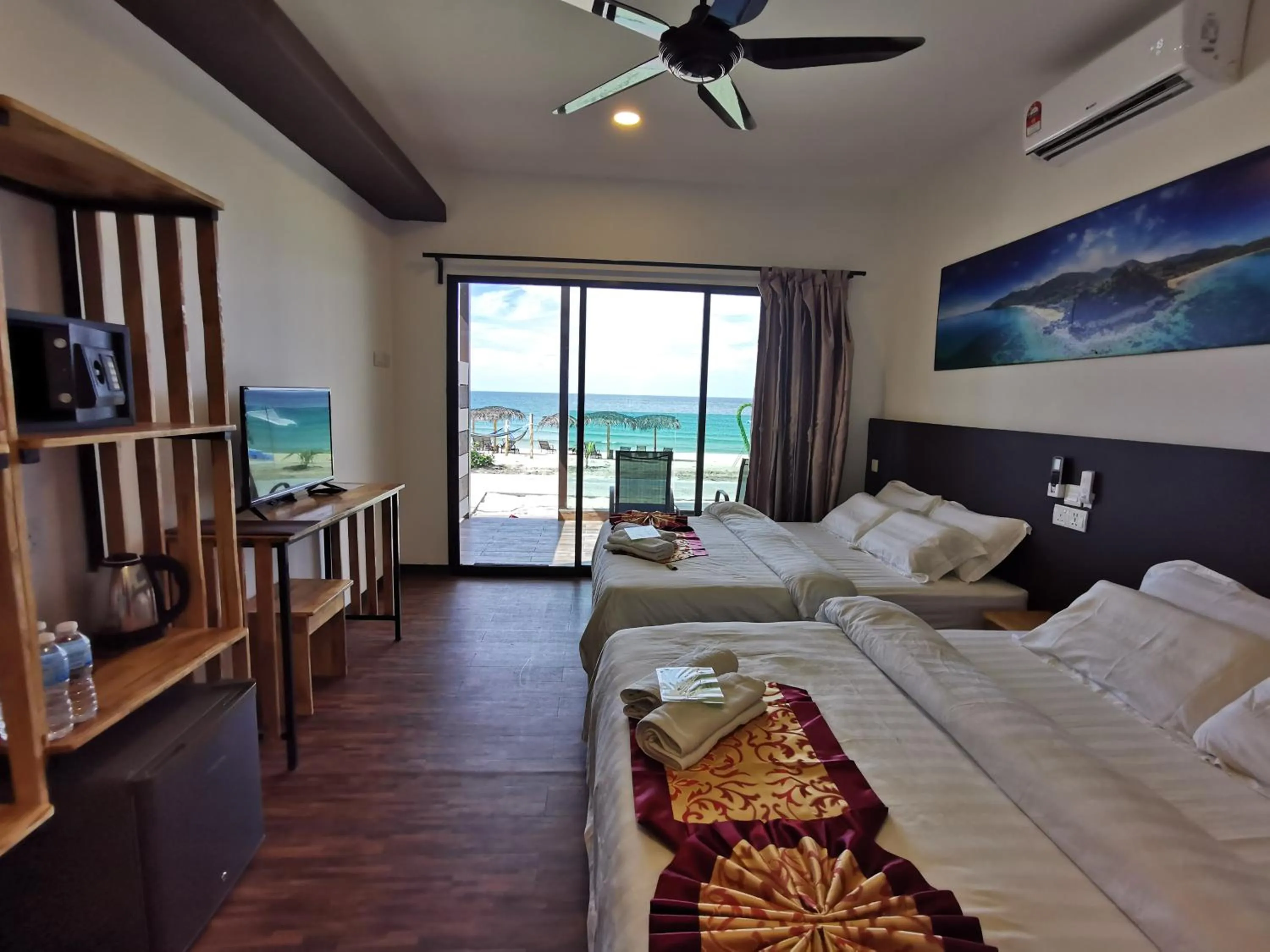 Bed in The Barat Tioman Beach Resort