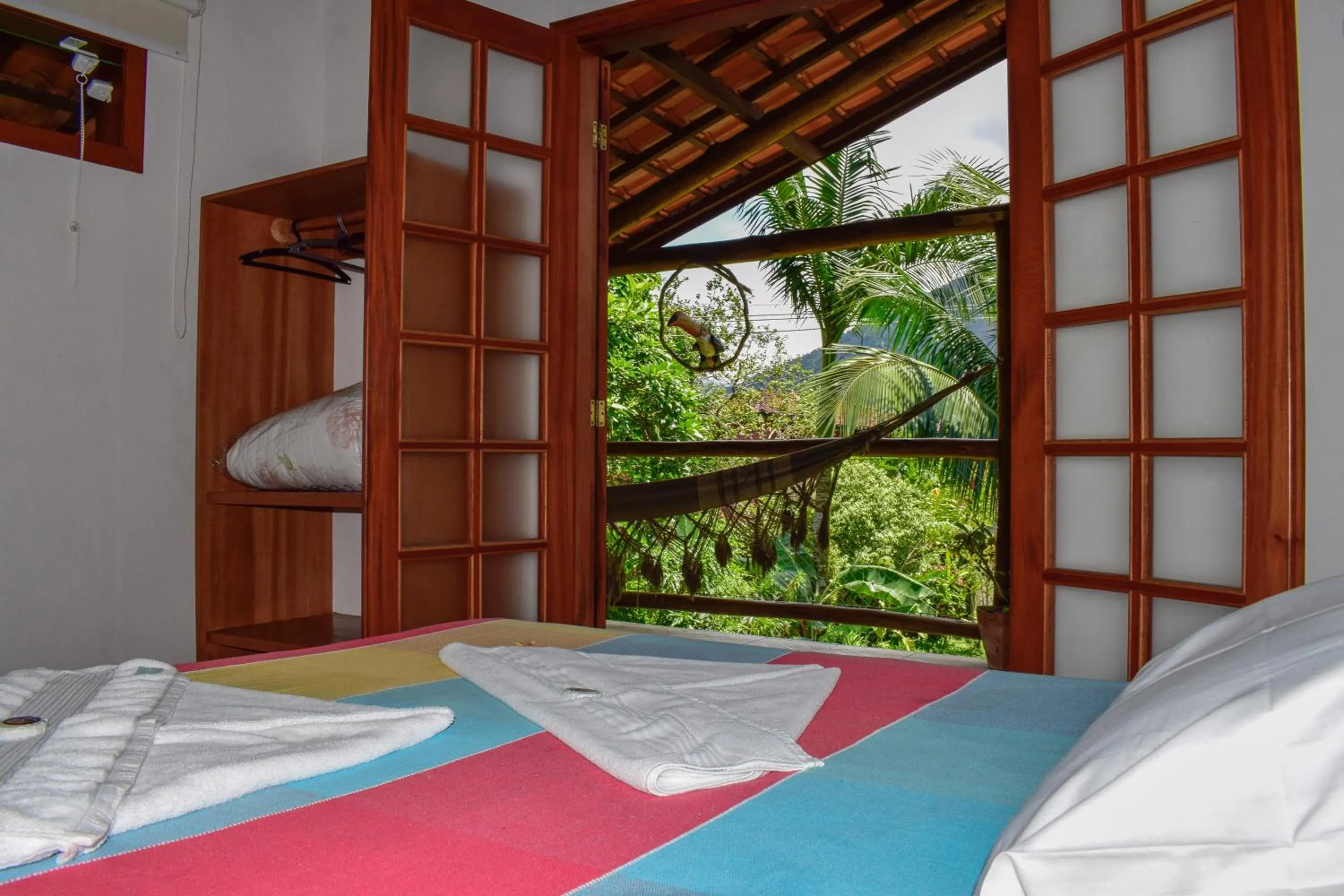 Bed in Pousada Capim Melado