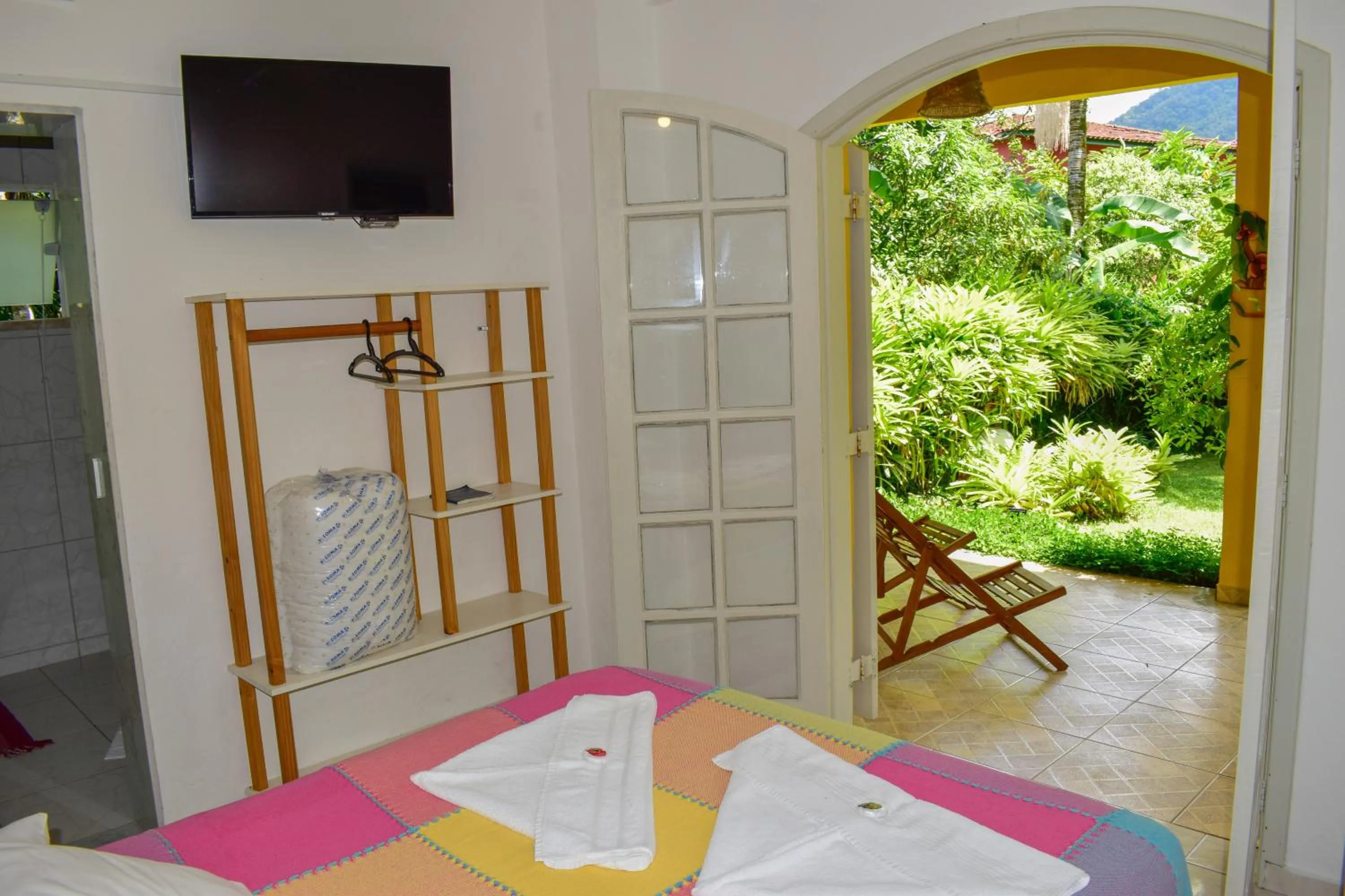 Bed in Pousada Capim Melado