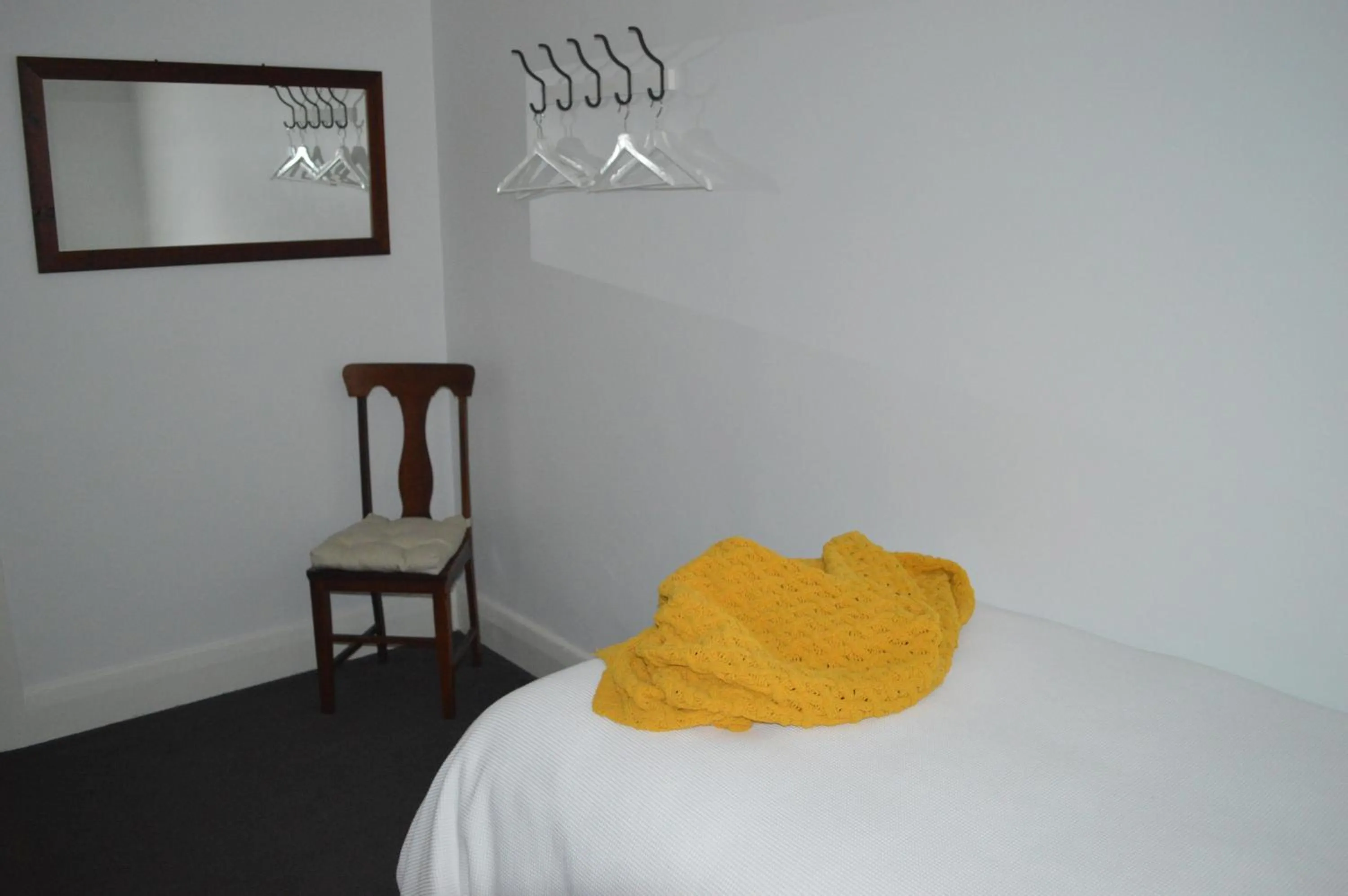 Bed in Two Cow Cottage Bed & Breakfast