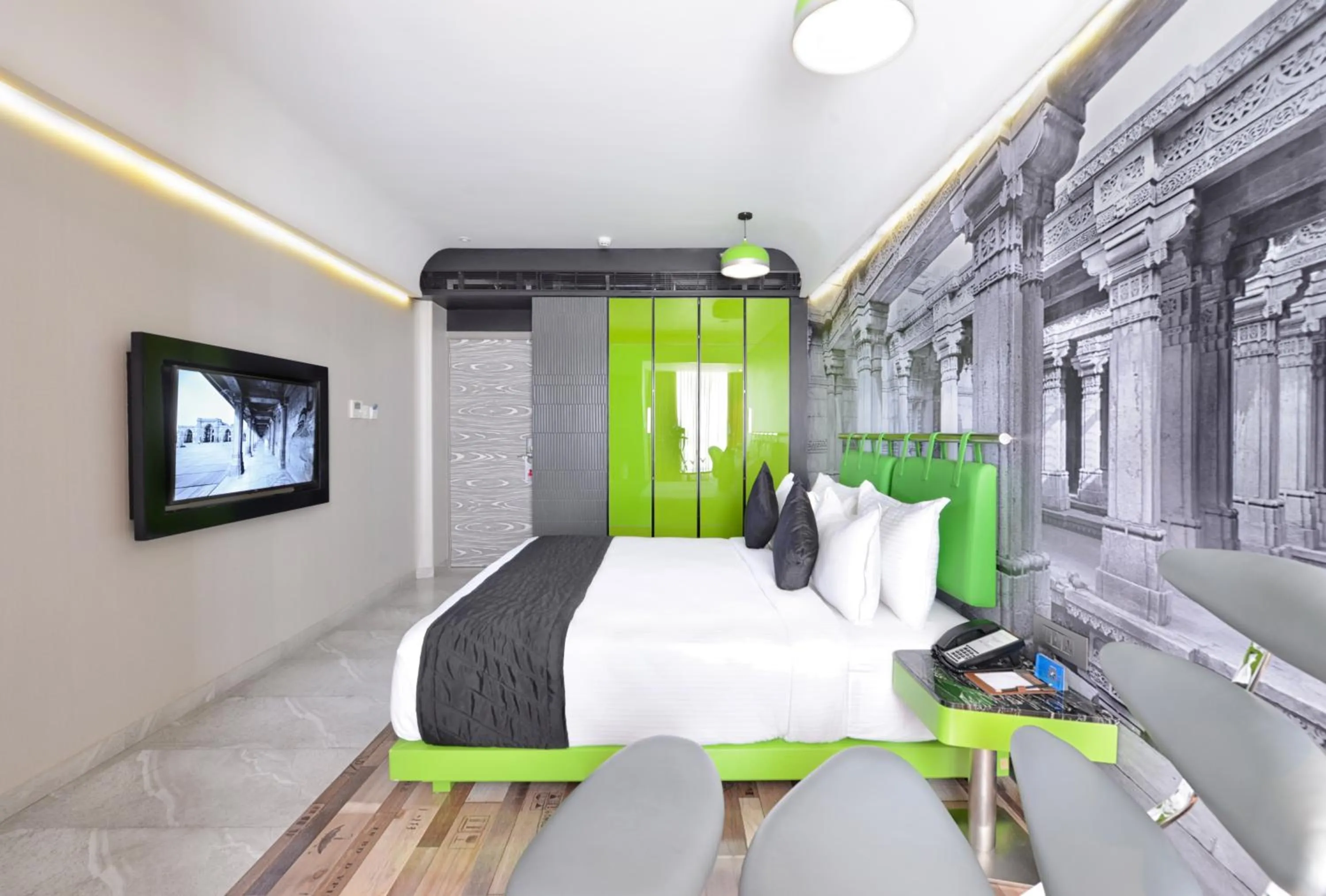 Photo of the whole room, Bed in Regenta Central Antarim Ahmedabad