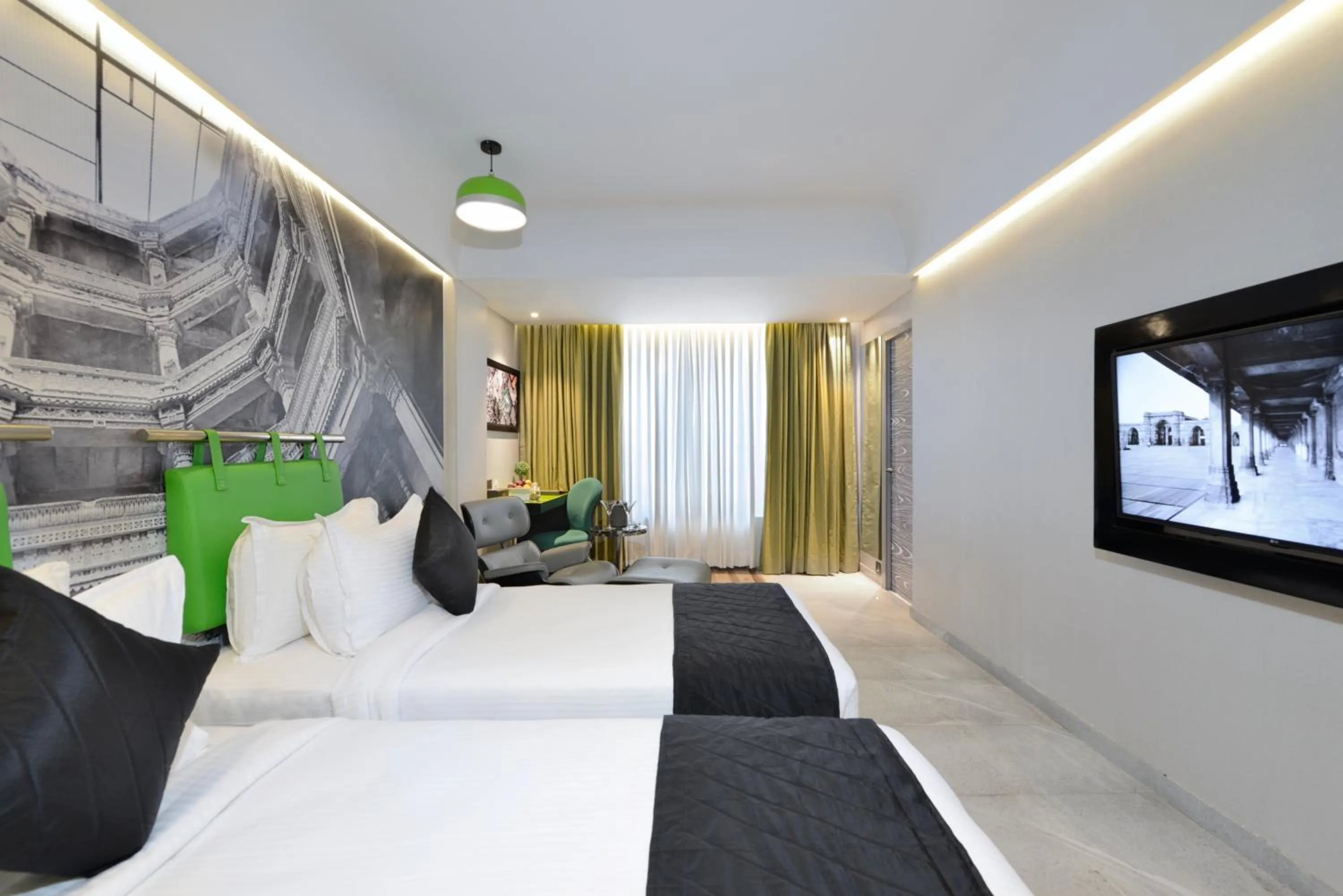 Bed in Regenta Central Antarim Ahmedabad