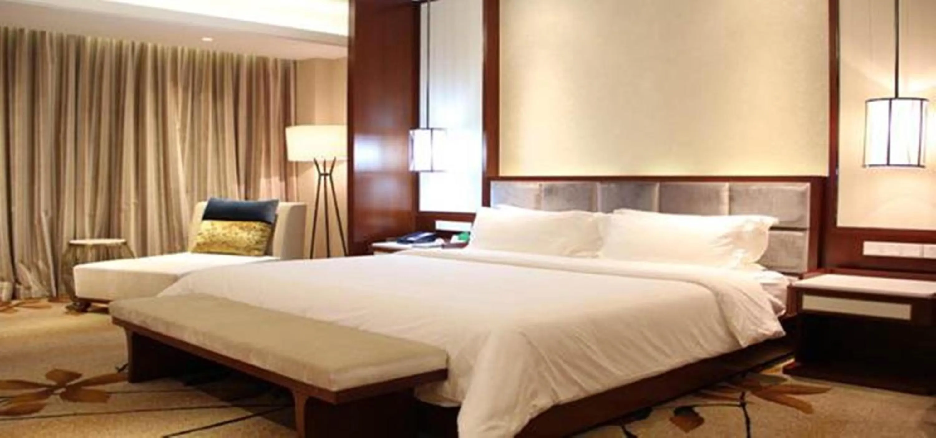 Photo of the whole room, Bed in Jiangsu Haizhou Bayview Conference Center