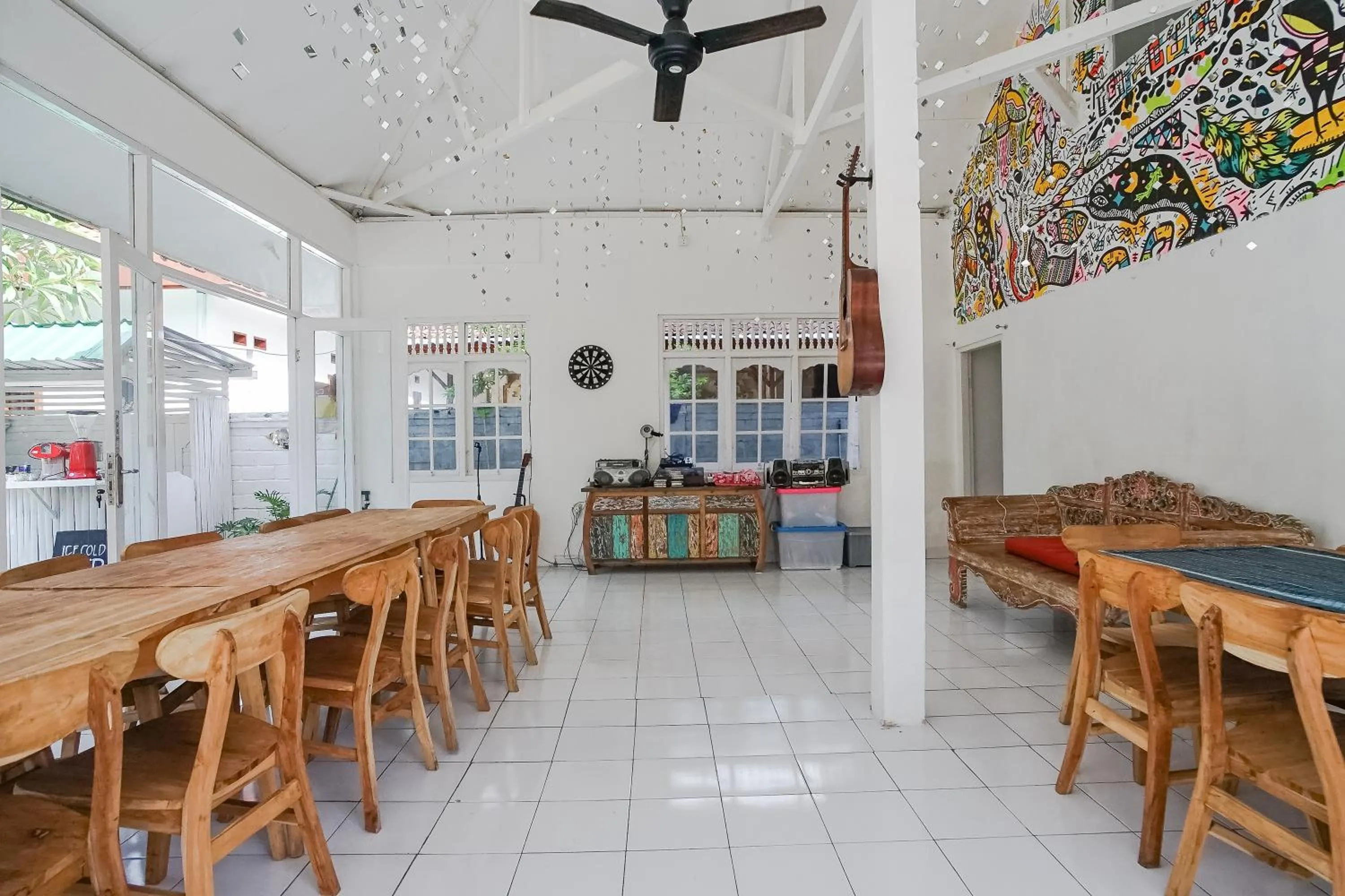 Dining area in Indopurejoy House - Komala Indah Cottages