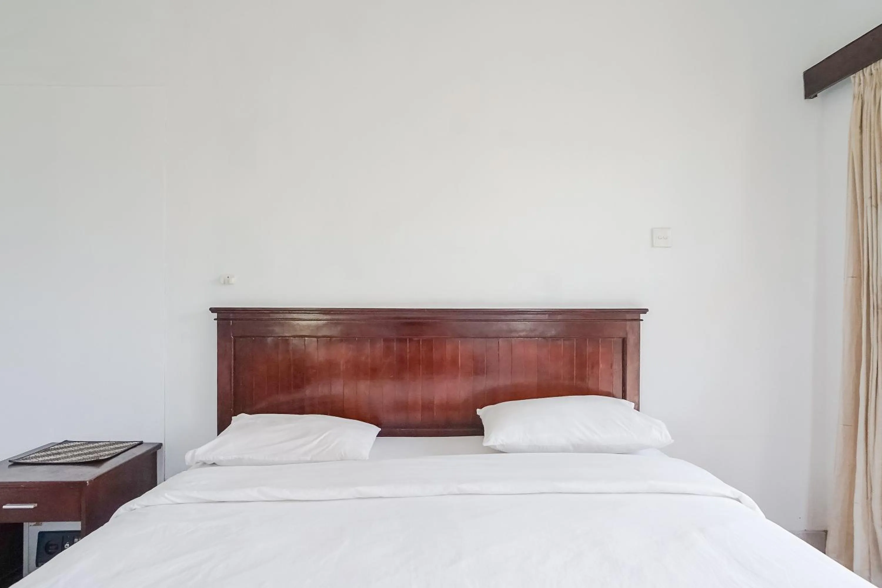 Bed in Indopurejoy House - Komala Indah Cottages