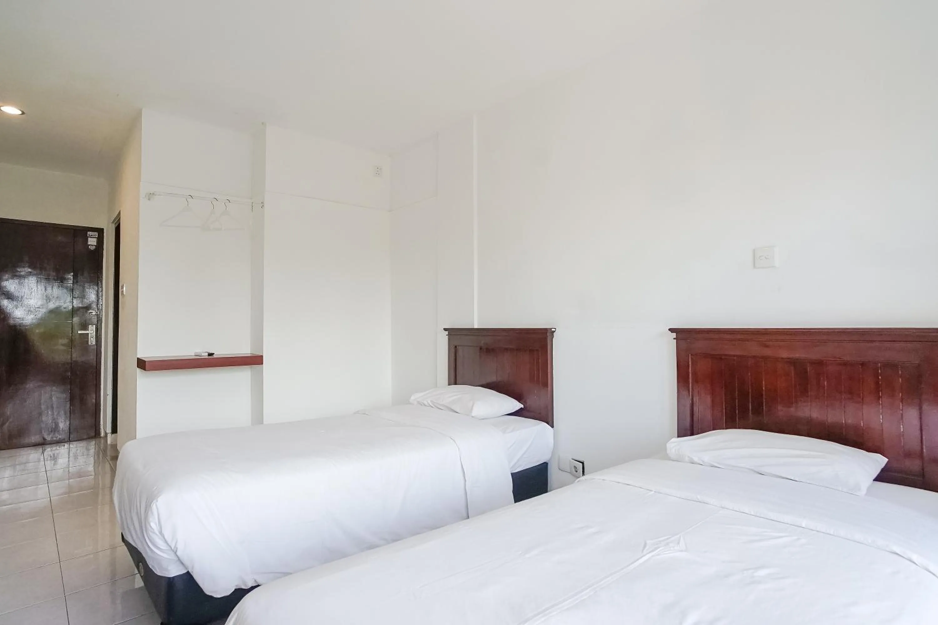 Bed in Indopurejoy House - Komala Indah Cottages