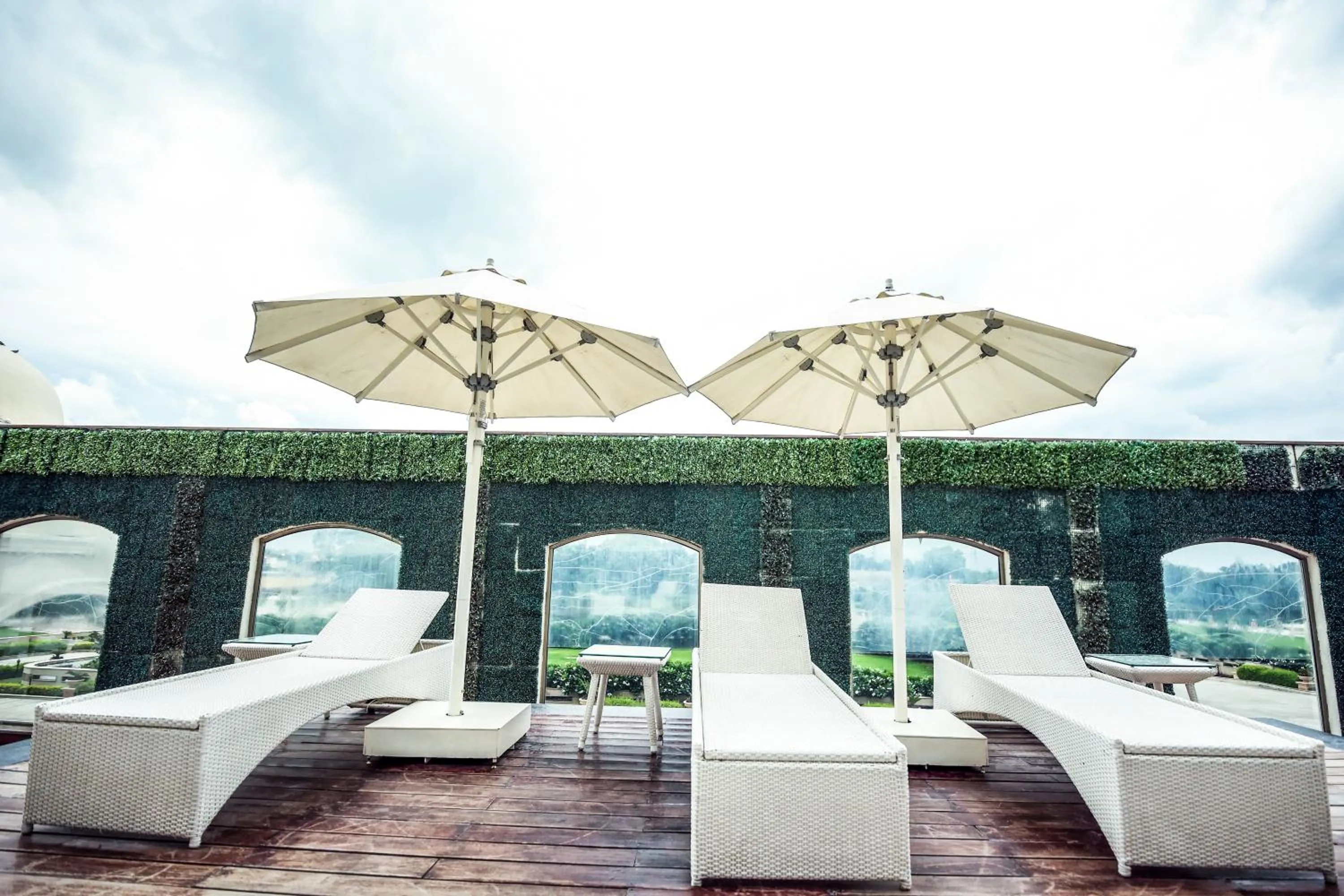 Swimming pool in Ramada by Wyndham Lucknow Hotel and Convention Center