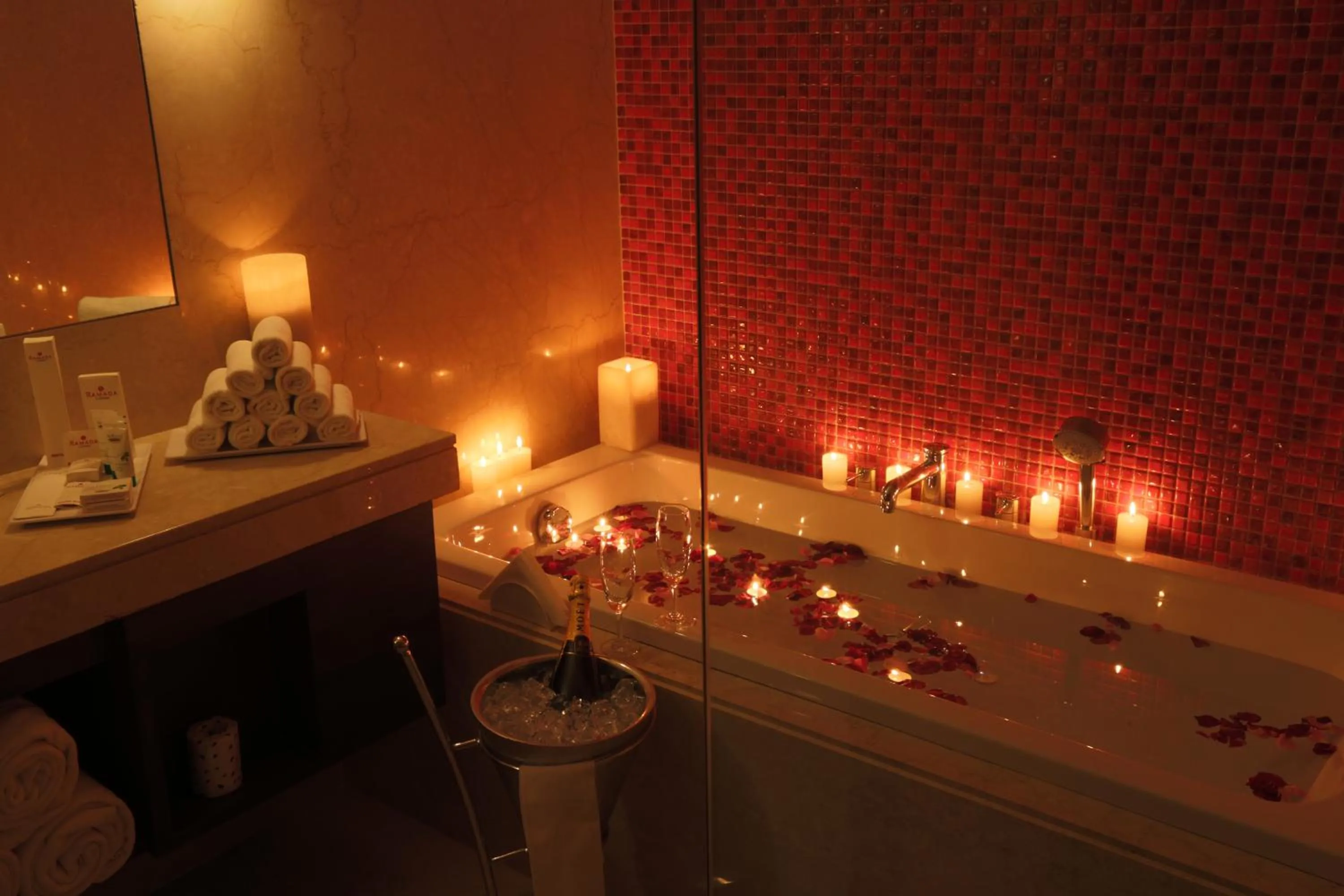 Bathroom in Ramada by Wyndham Lucknow Hotel and Convention Center