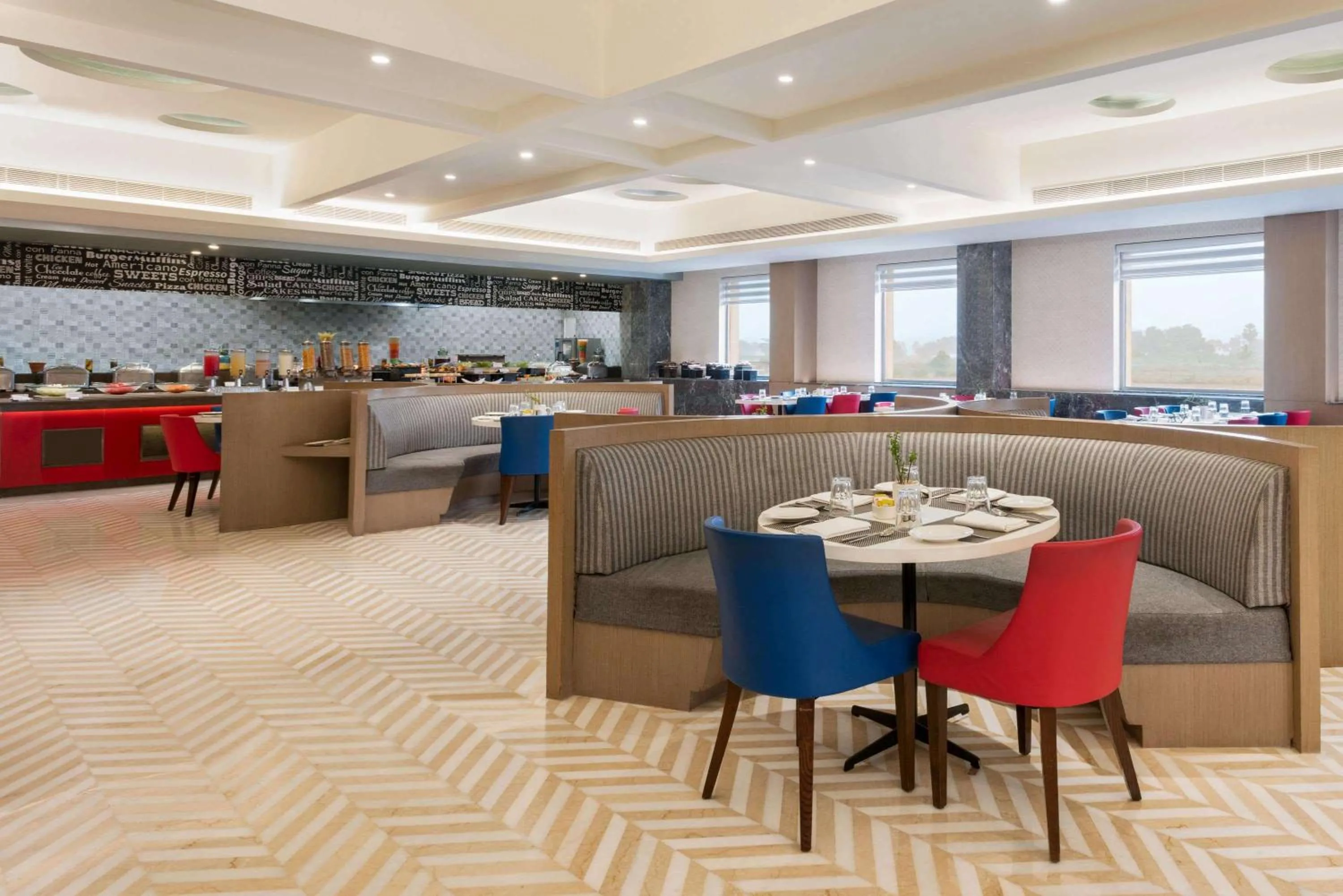 Restaurant/places to eat in Ramada by Wyndham Lucknow Hotel and Convention Center