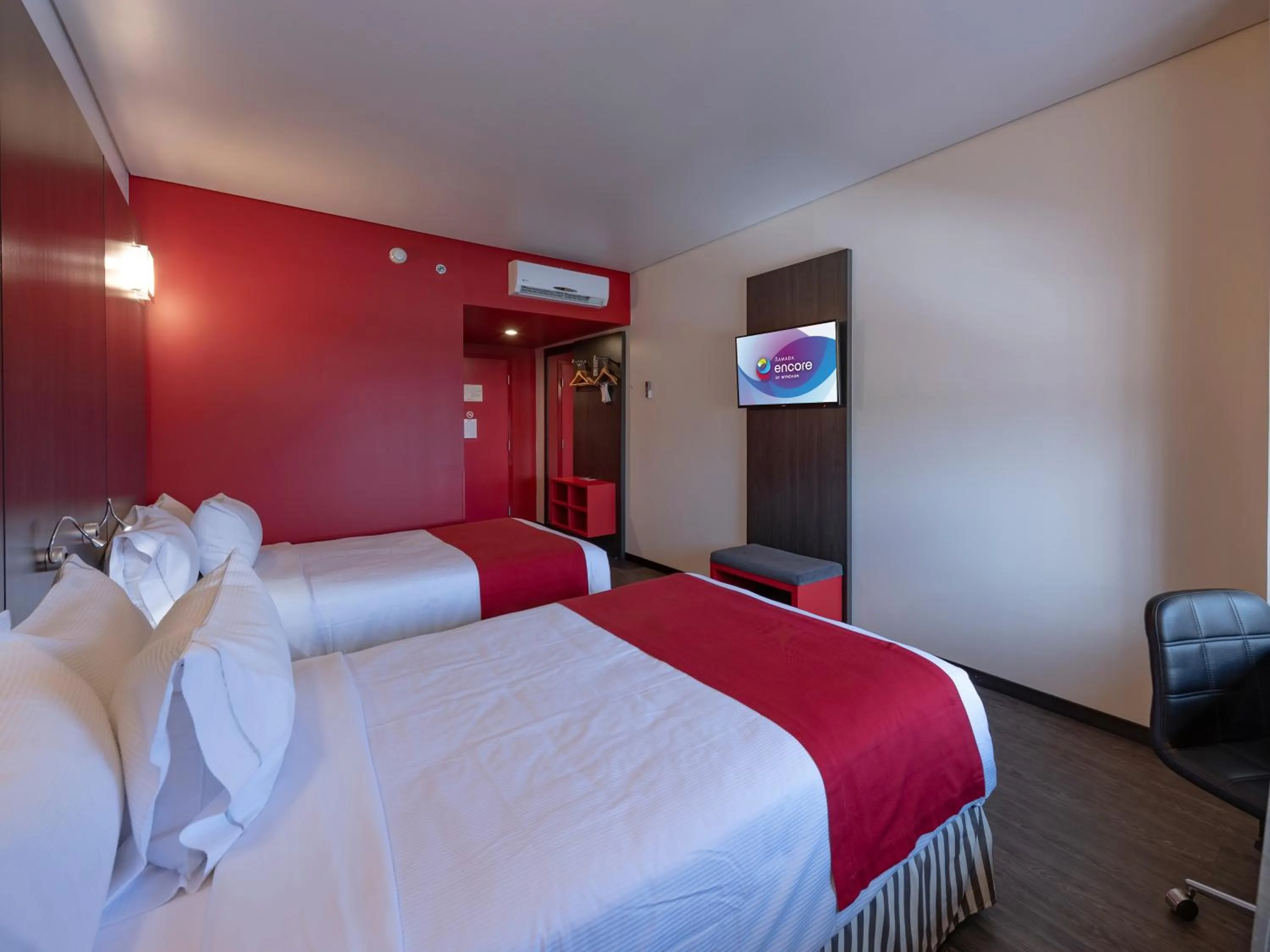 Bedroom, Bed in Ramada Encore by Wyndham Puebla