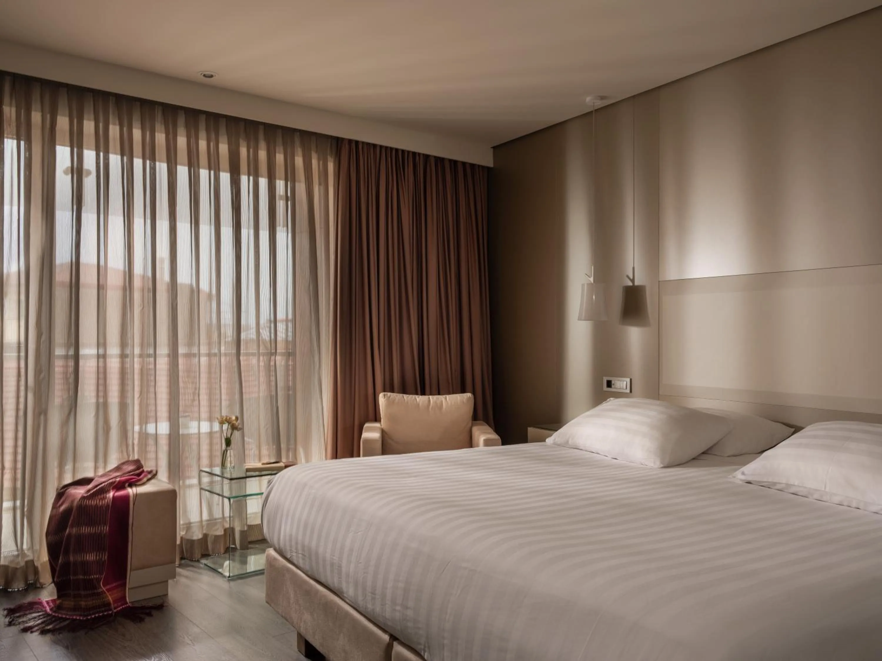 Bed in SAZ City Life Boutique Hotel