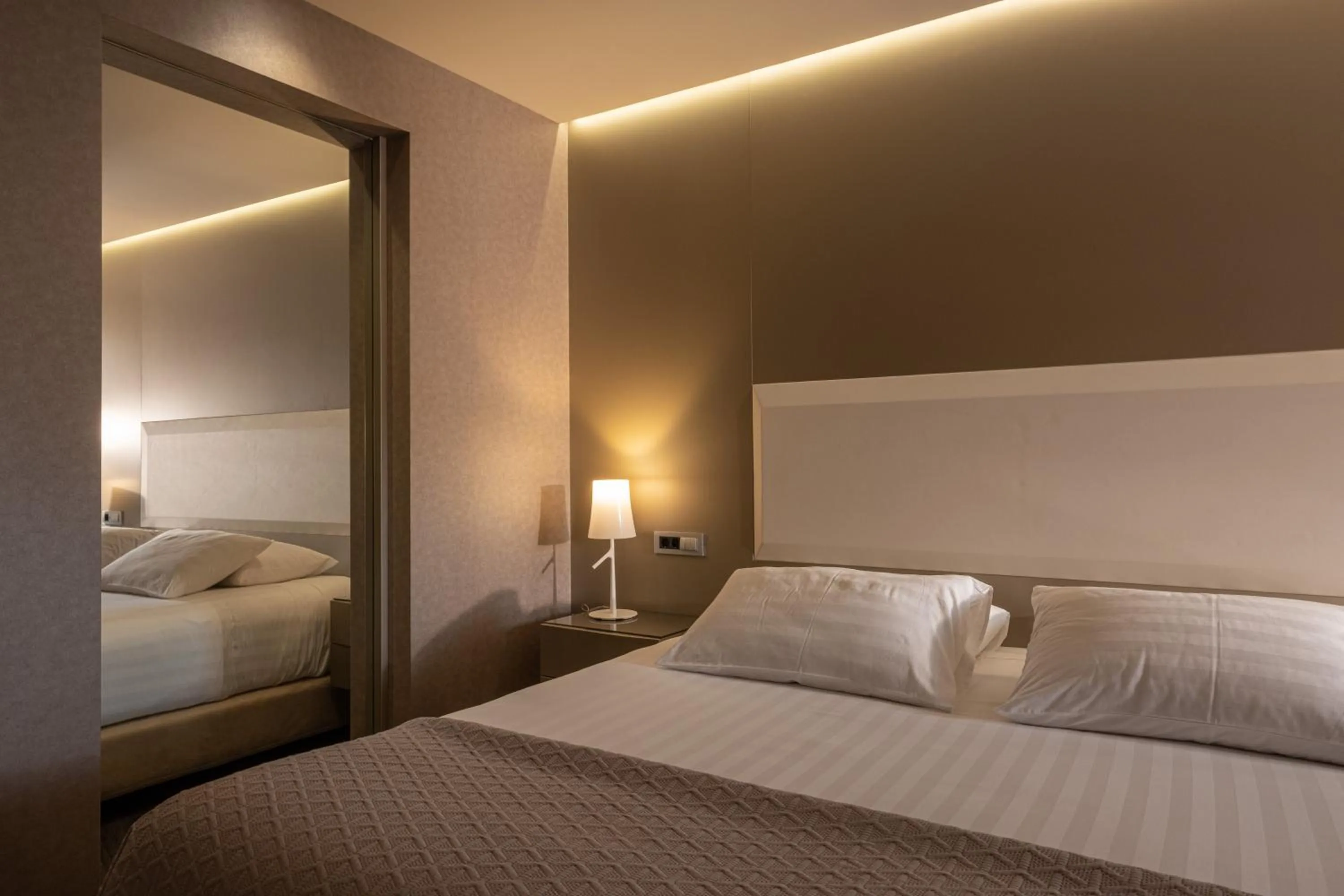 Bed in SAZ City Life Boutique Hotel