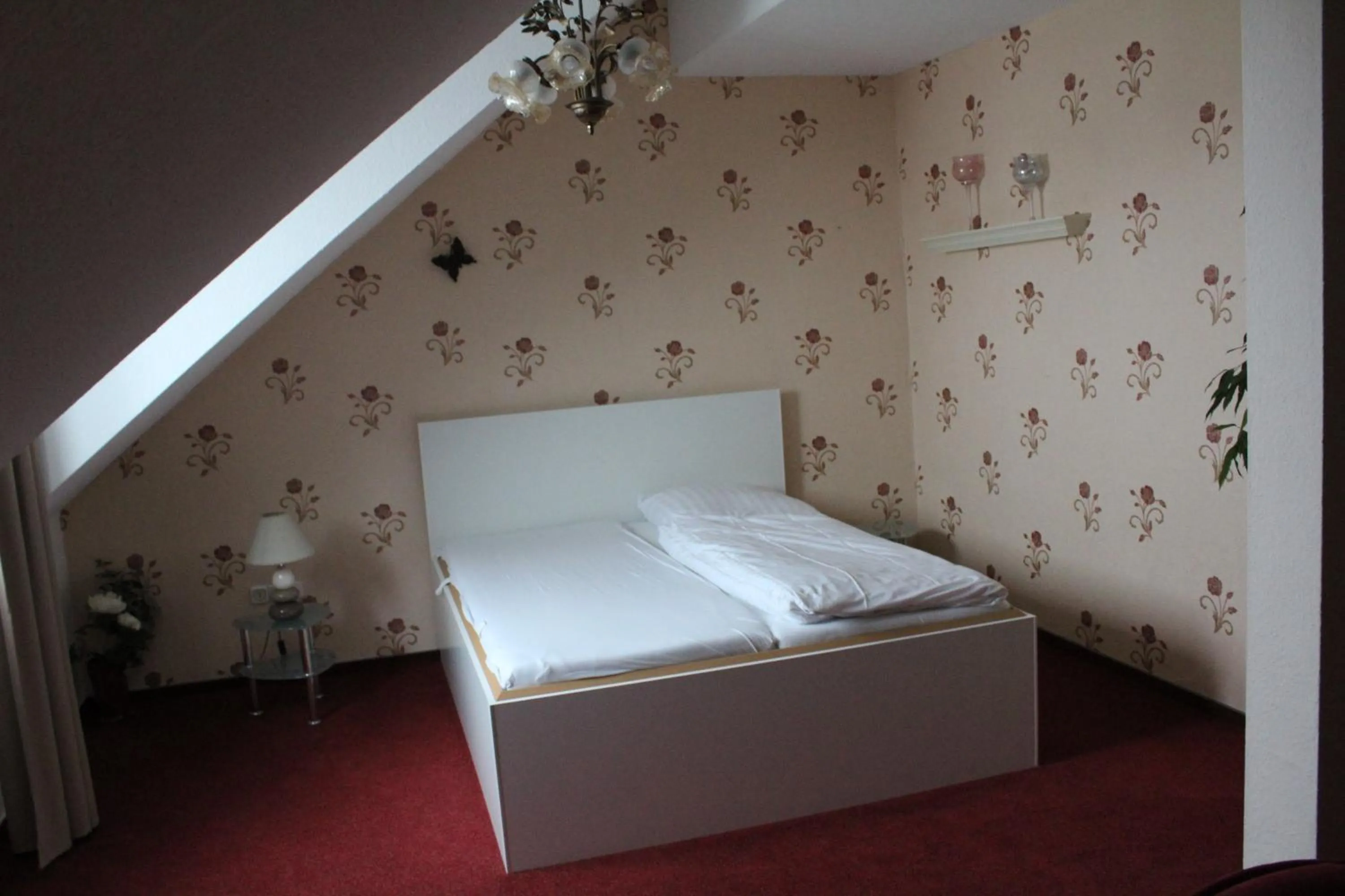 Bed in Hotel Gardenia