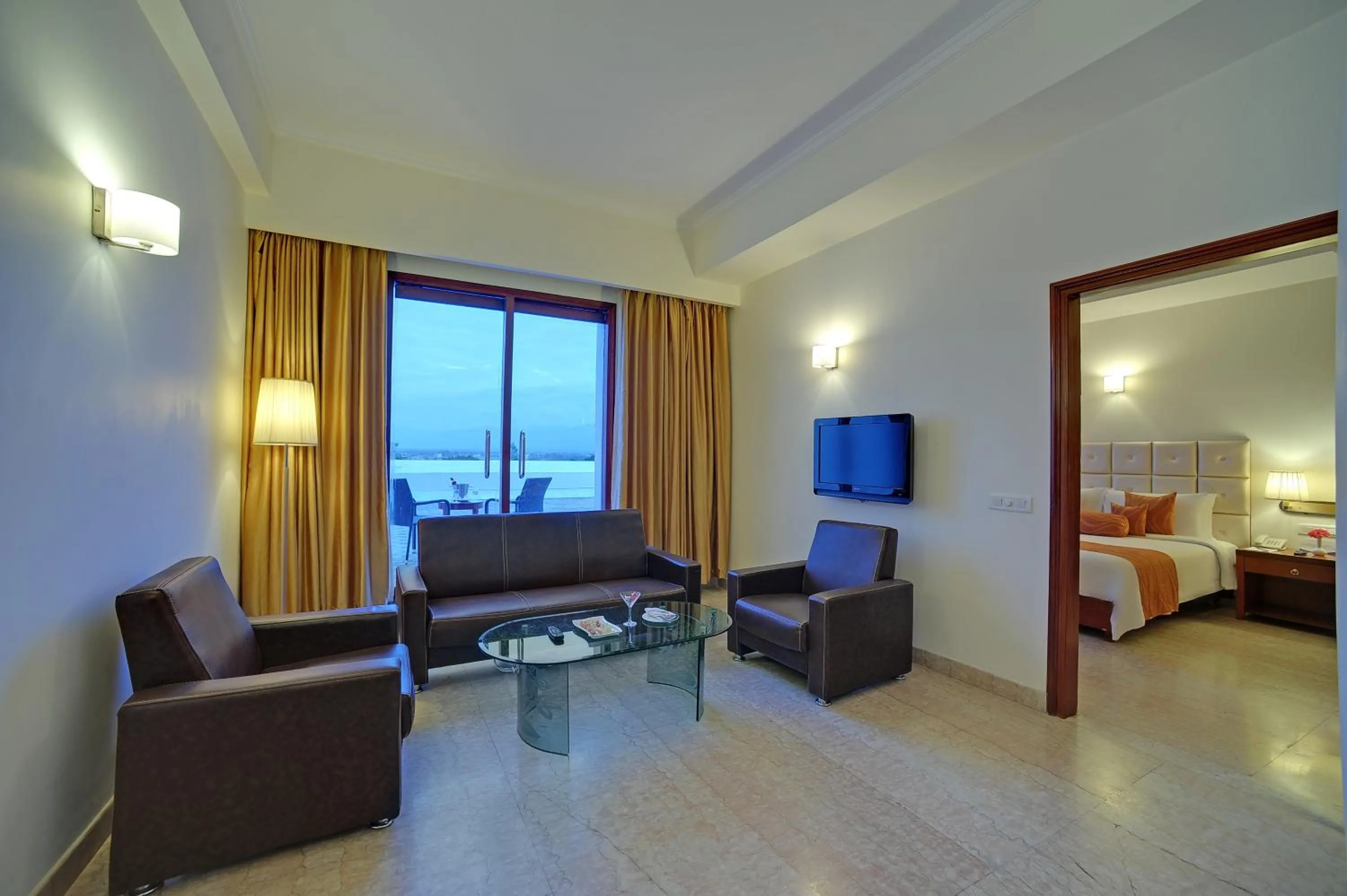 Living room, Bed in Royal Sarovar Portico Siliguri
