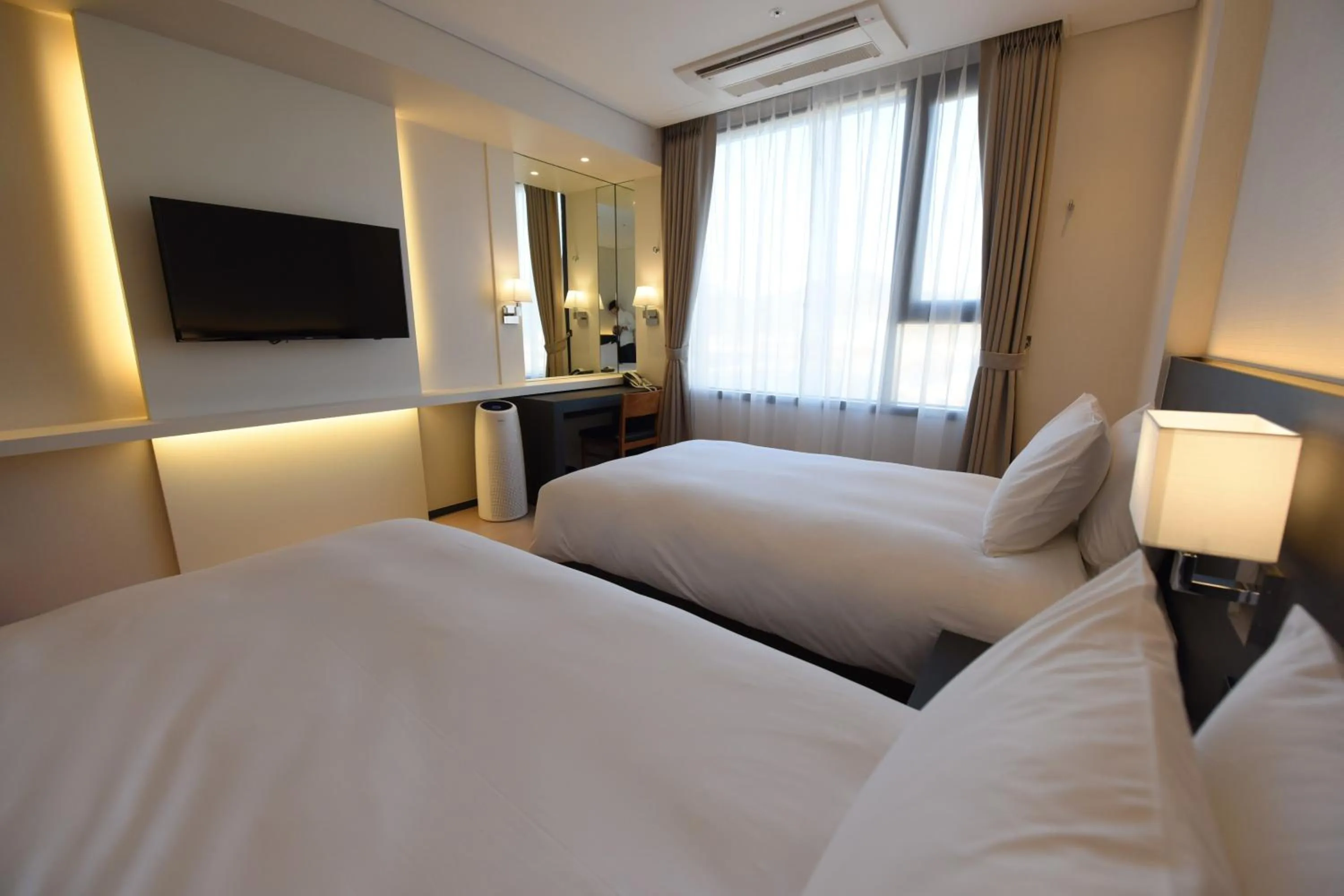 Bed in Geoje Artnouveau Suite Hotel