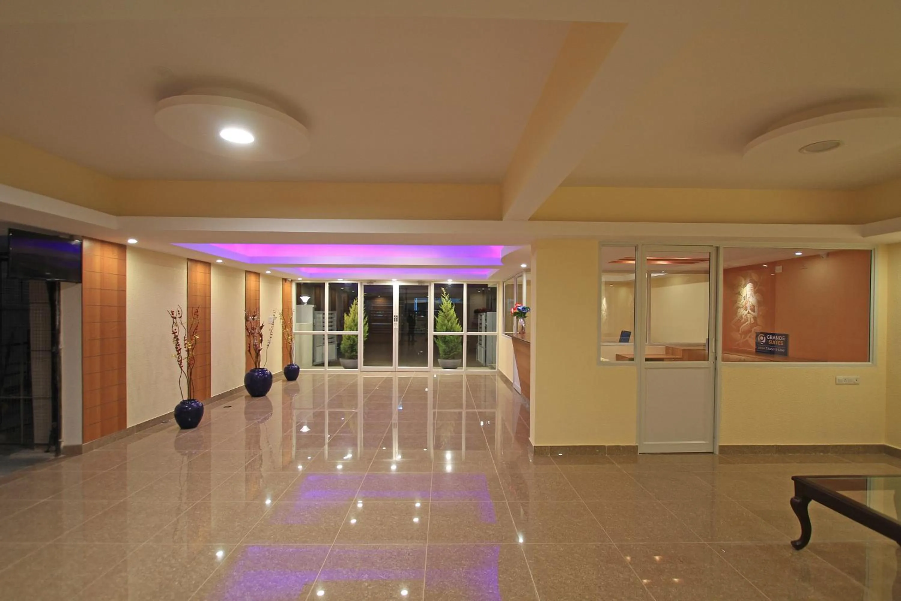 Lobby or reception in Arra Grande Suites Bangalore airport hotel