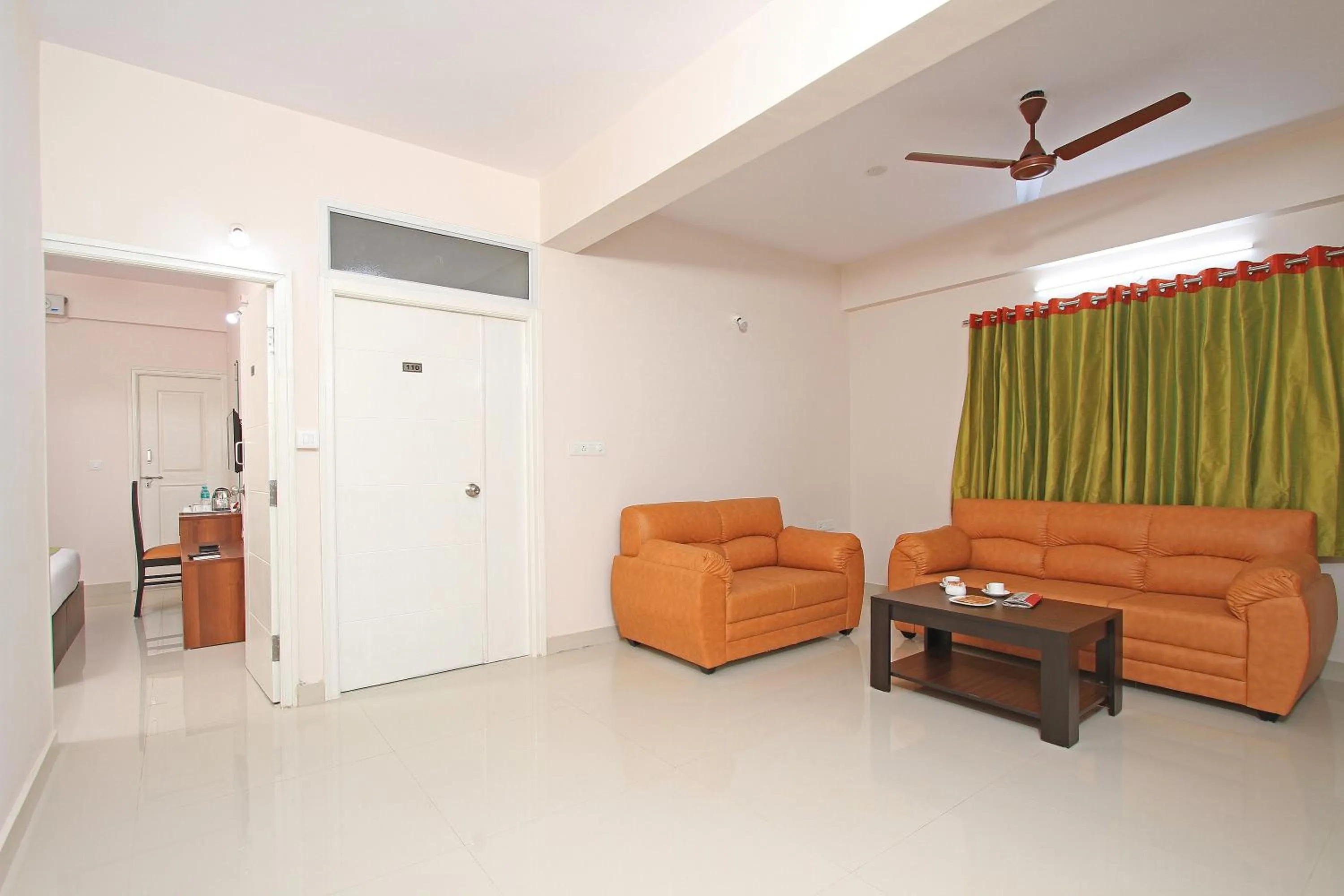 Living room in Arra Grande Suites Bangalore airport hotel