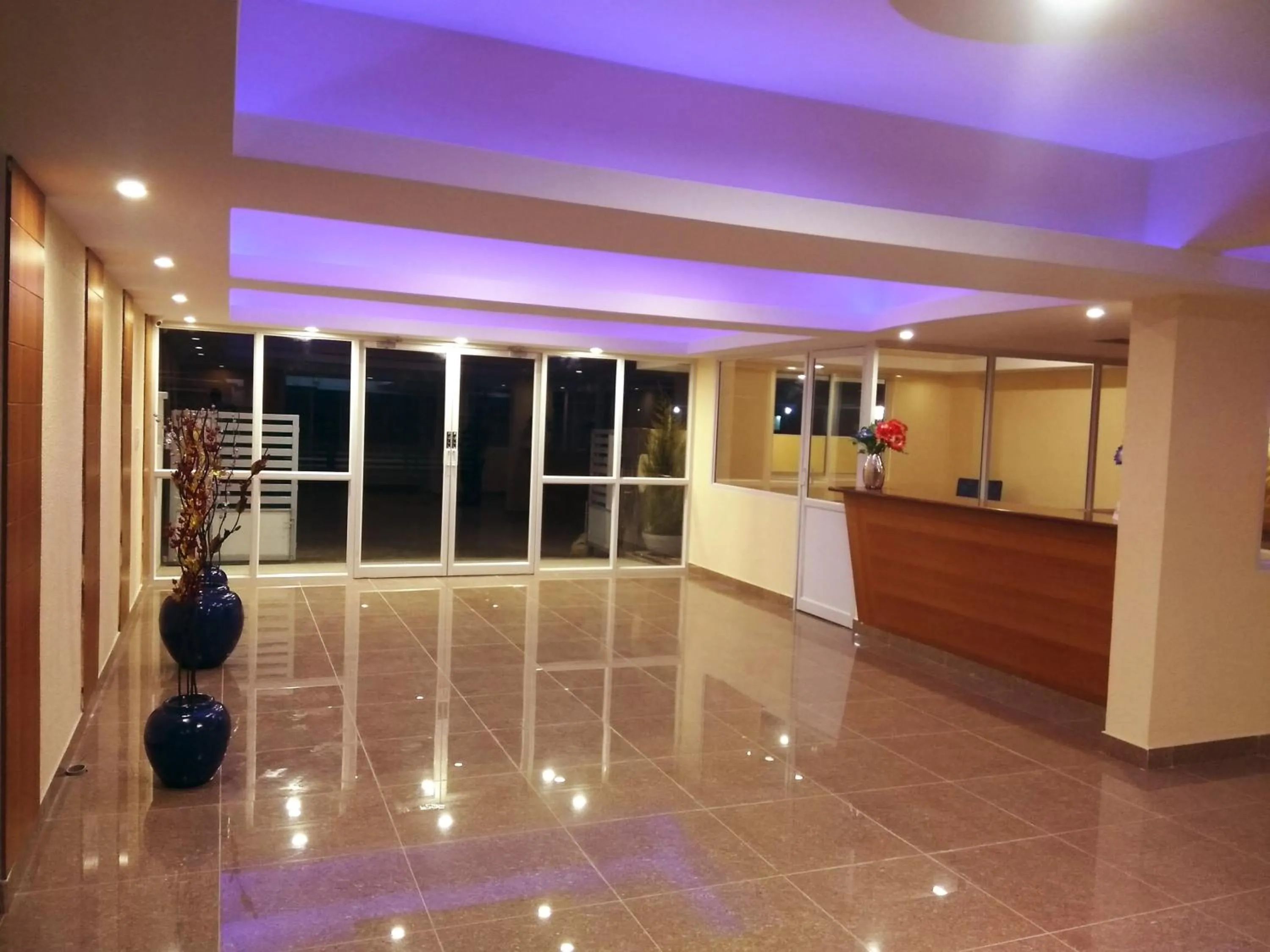 Lobby or reception in Arra Grande Suites Bangalore airport hotel