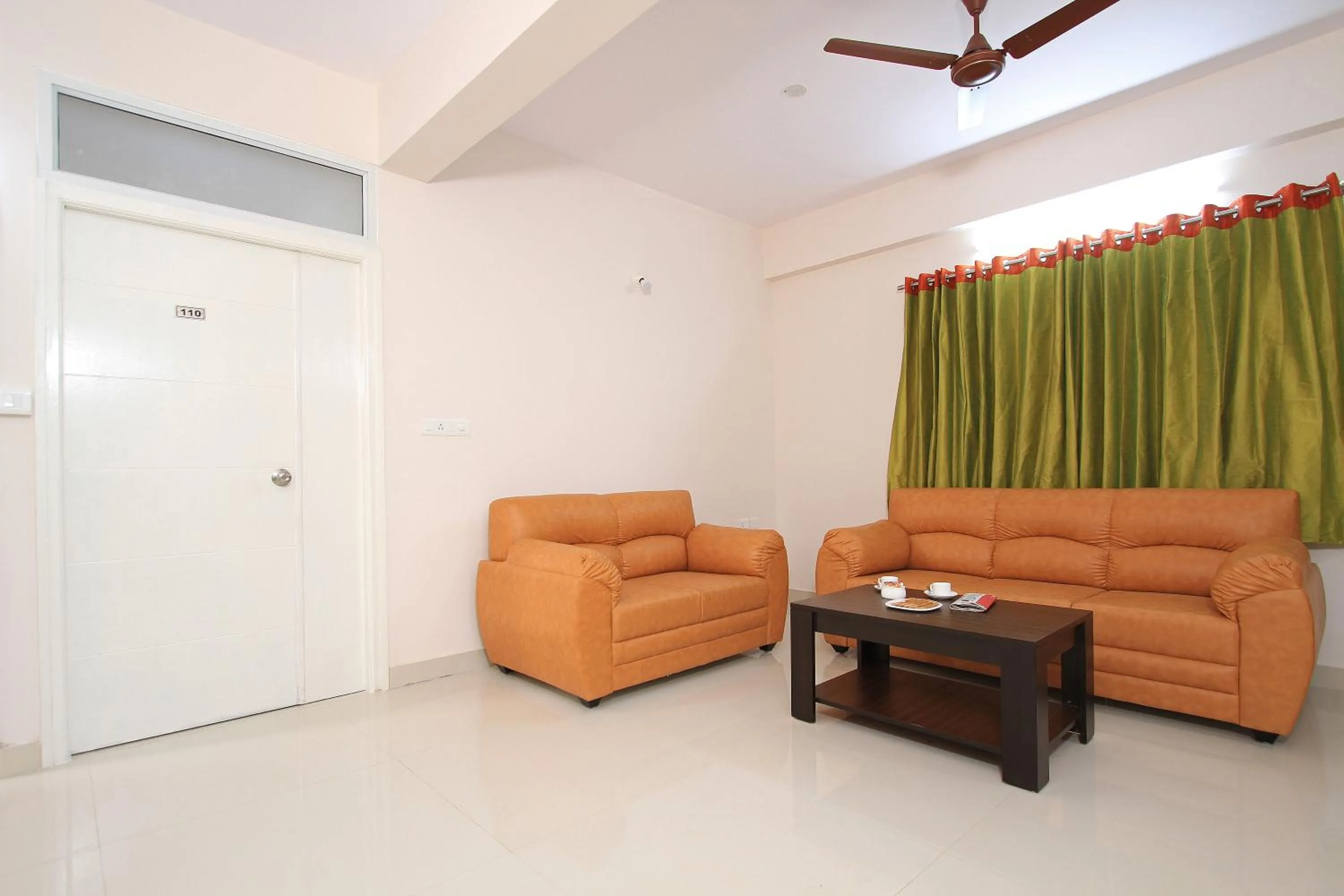 Living room in Arra Grande Suites Bangalore airport hotel