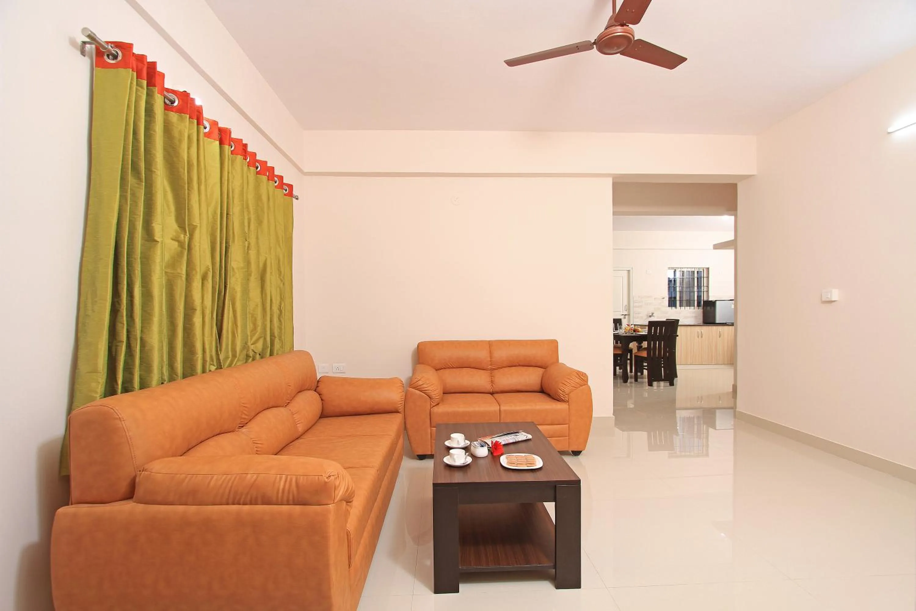 Living room in Arra Grande Suites Bangalore airport hotel