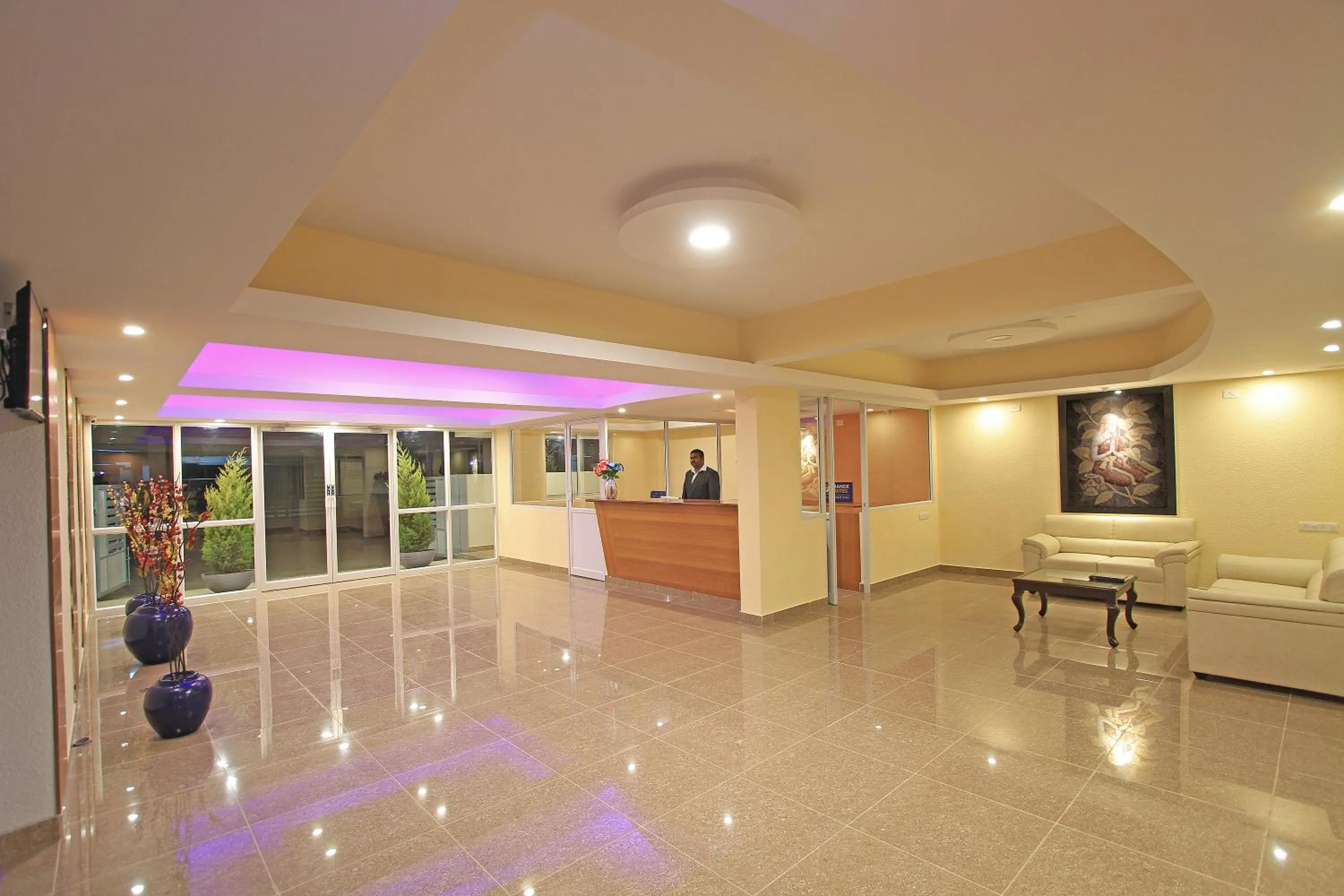 Lobby or reception in Arra Grande Suites Bangalore airport hotel