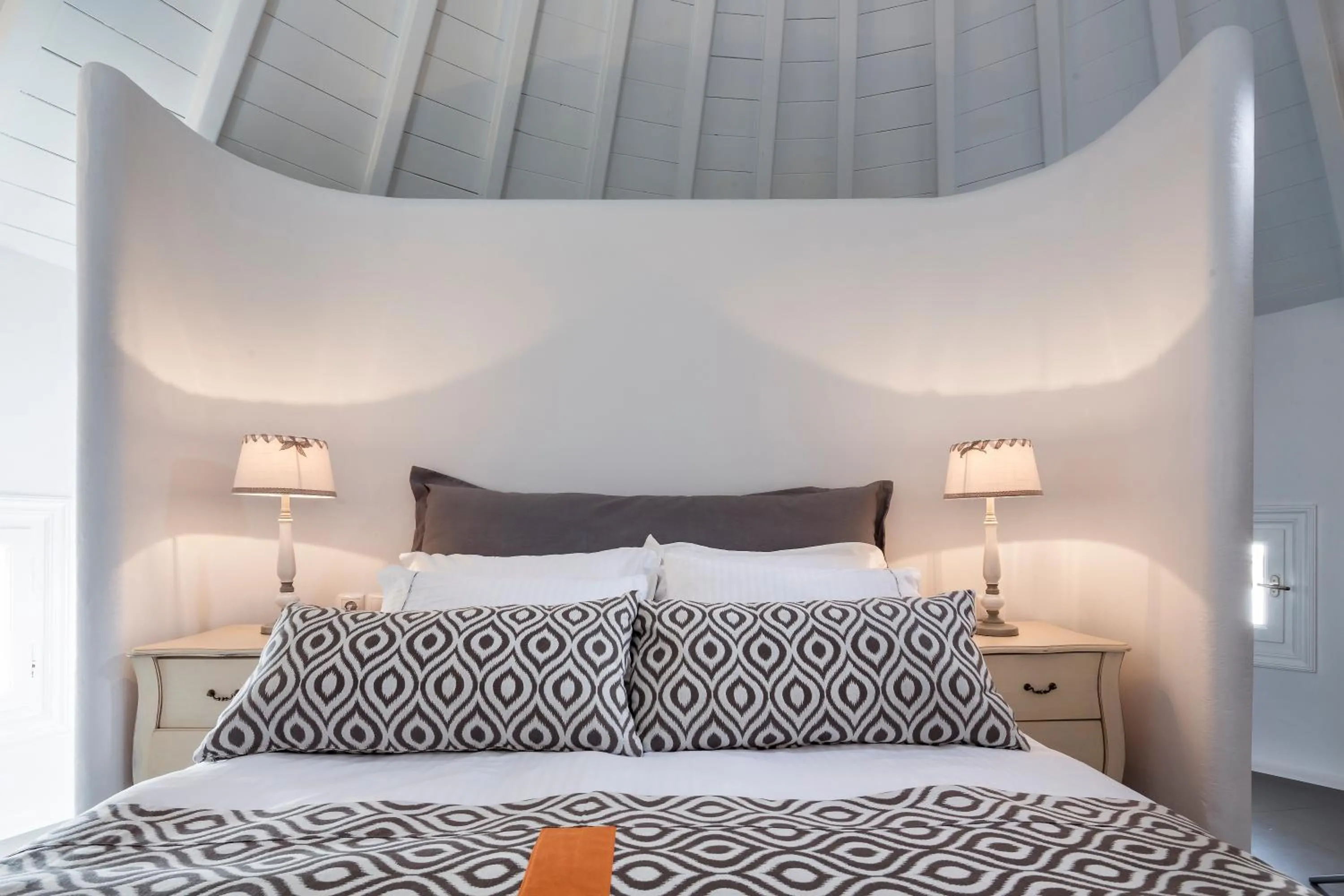 Bed in Absolute Mykonos Suites & More