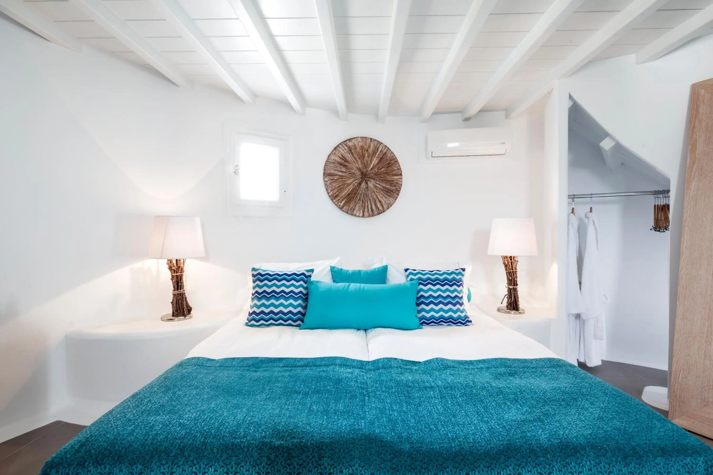 Bed in Absolute Mykonos Suites & More