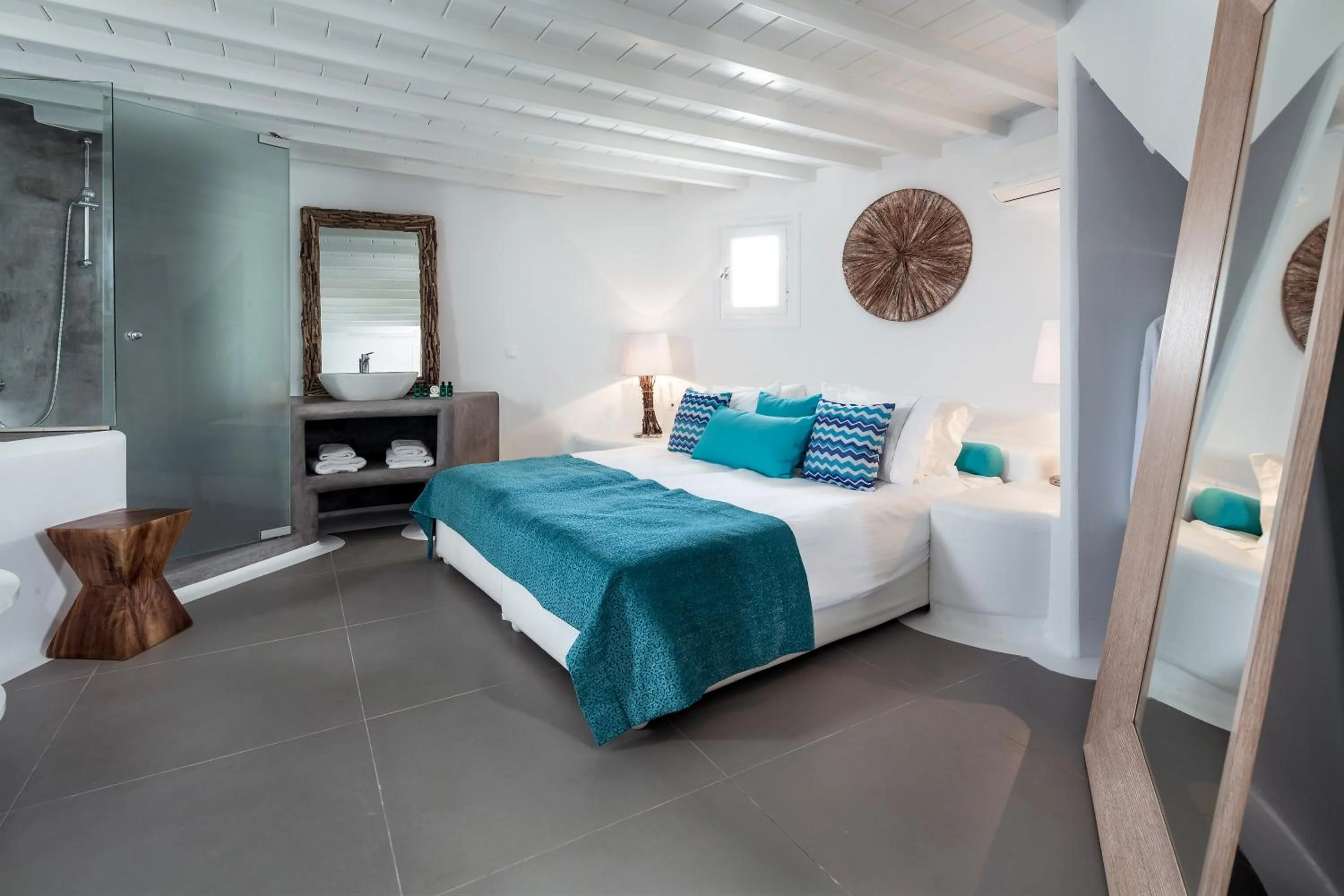 Bed in Absolute Mykonos Suites & More