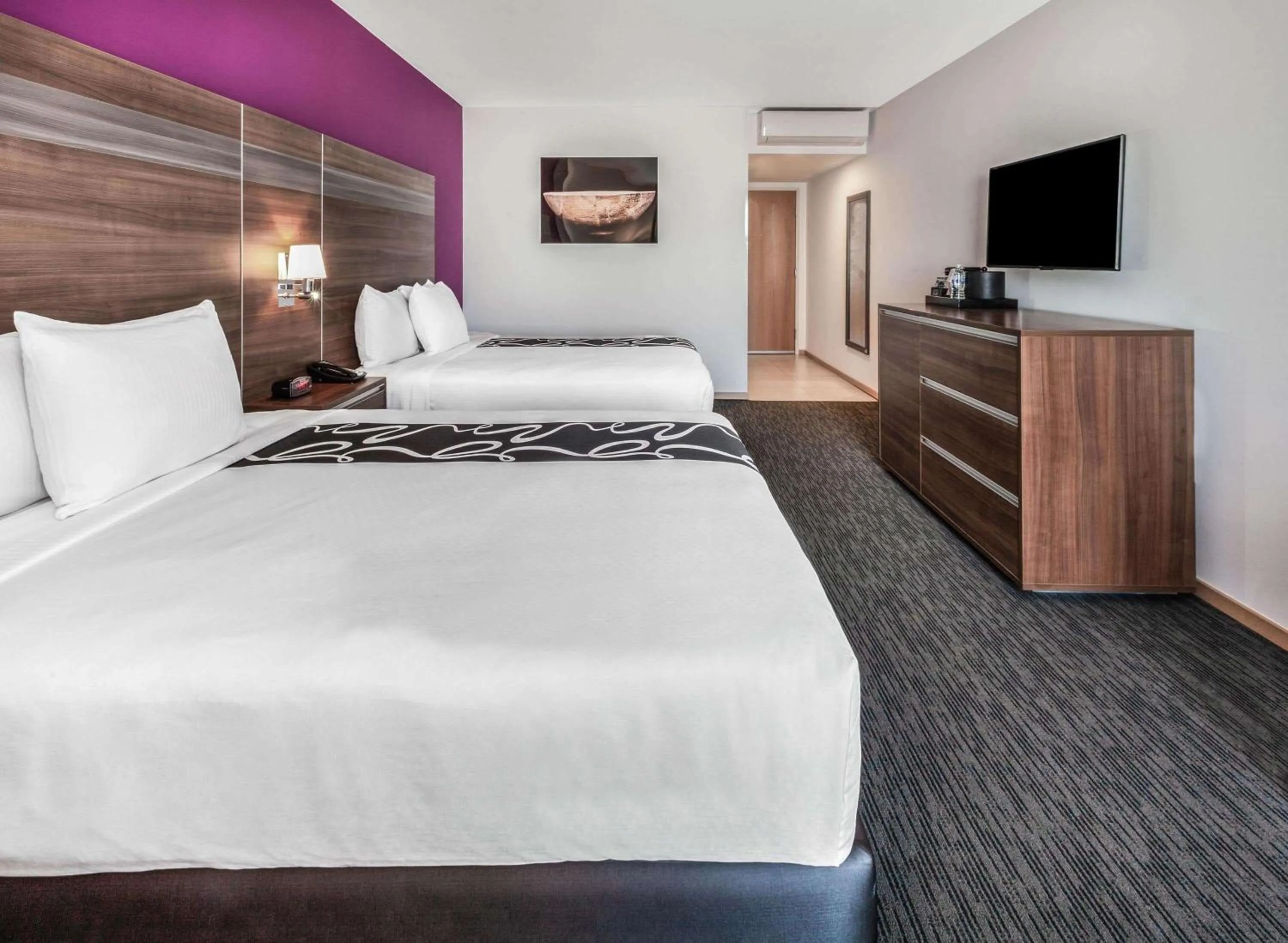 Photo of the whole room, Bed in La Quinta by Wyndham San Jose Chiapa Puebla