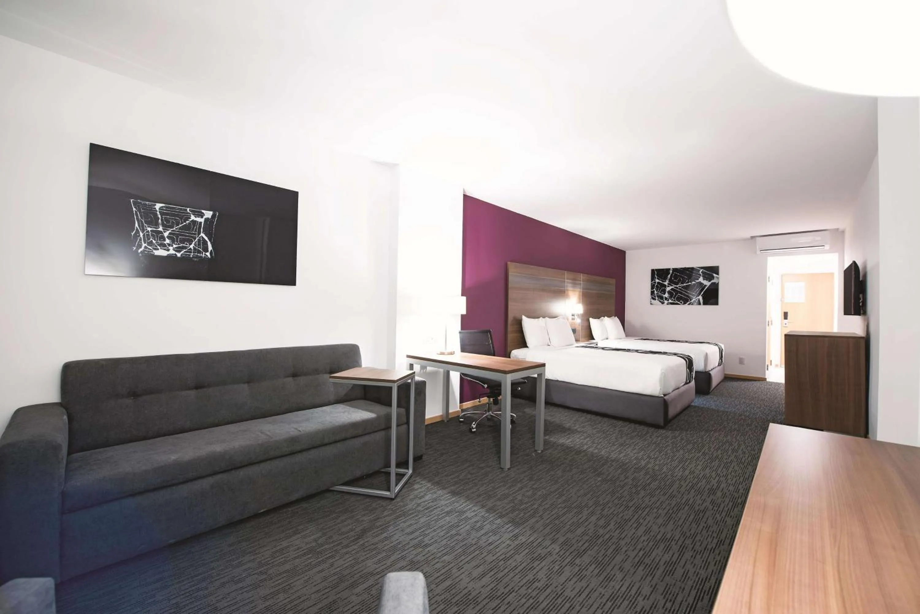 Photo of the whole room, Bed in La Quinta by Wyndham San Jose Chiapa Puebla