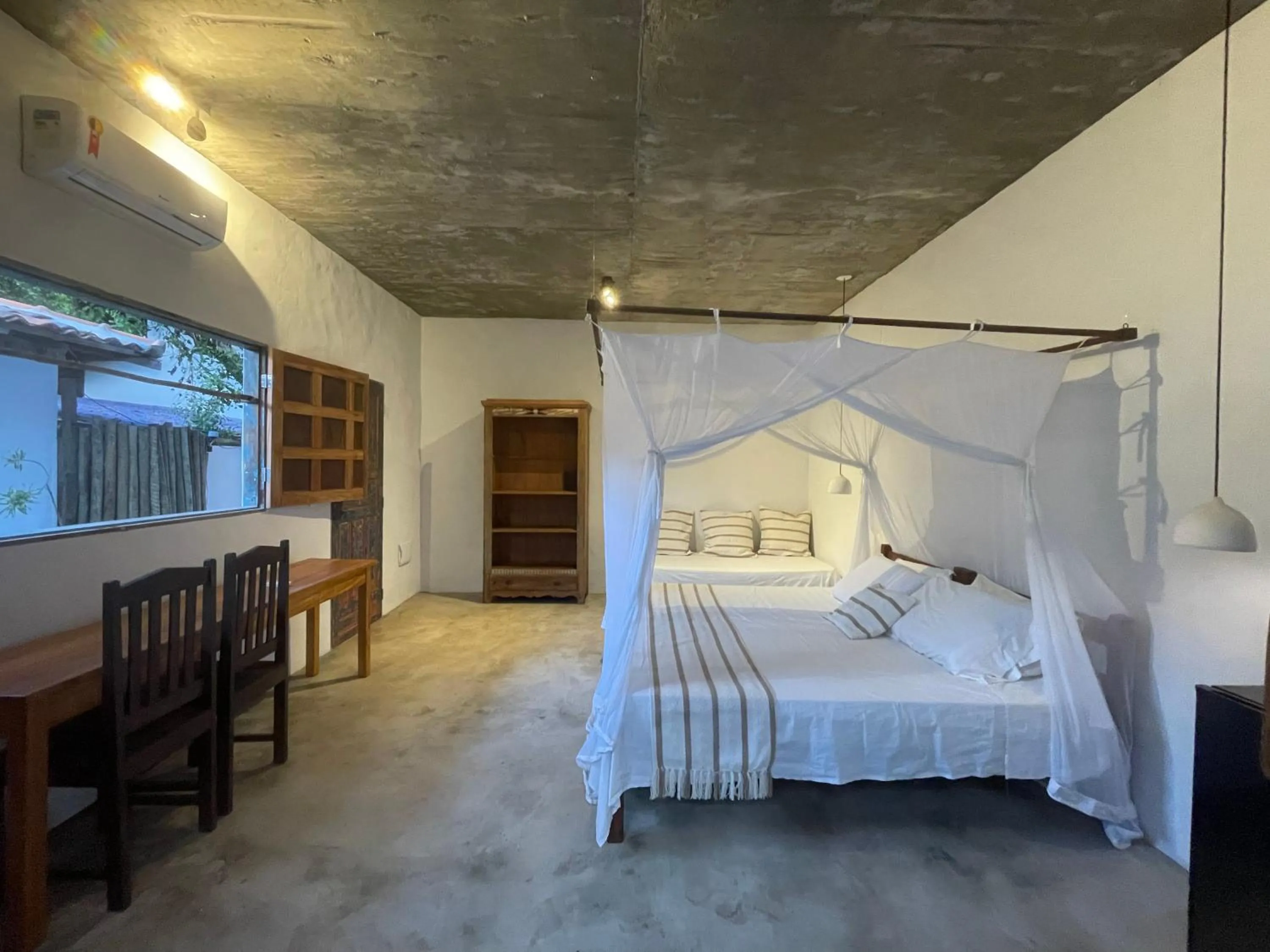 Bed in Pousada Spa Oasis