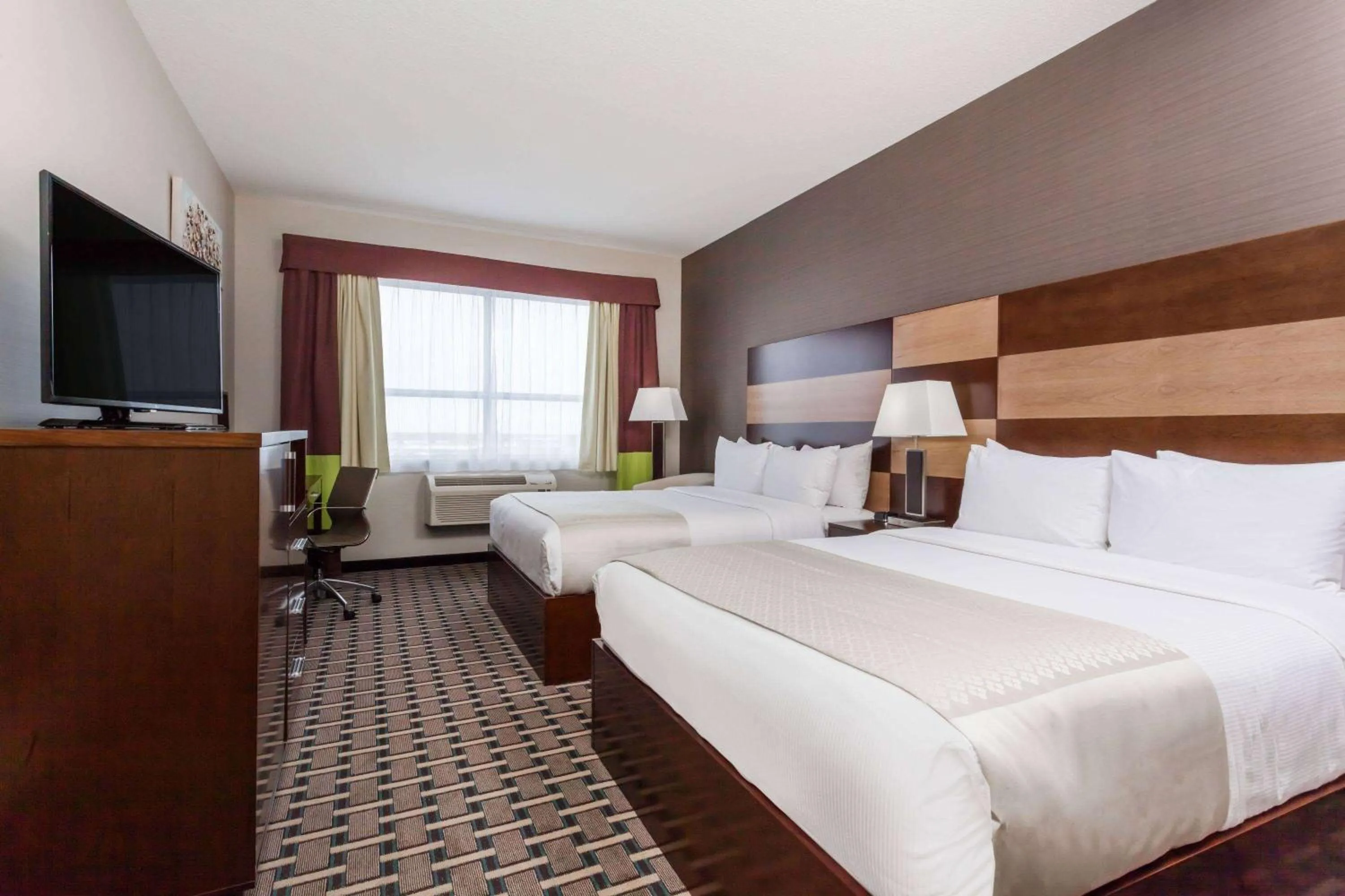 Photo of the whole room, Bed in Wyndham Garden Edmonton Airport