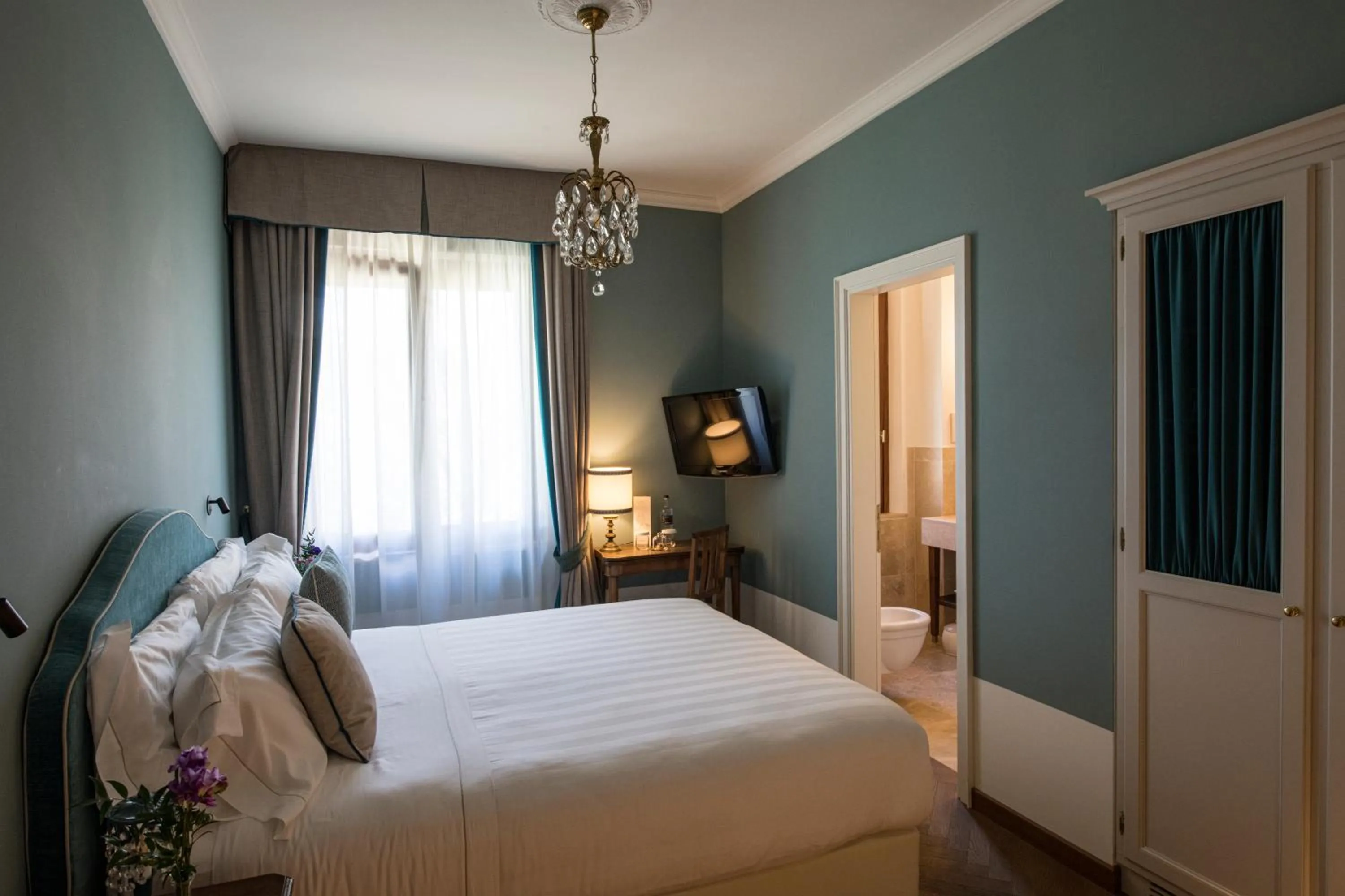 Bed in La Posta Hotel & Thermal Spa