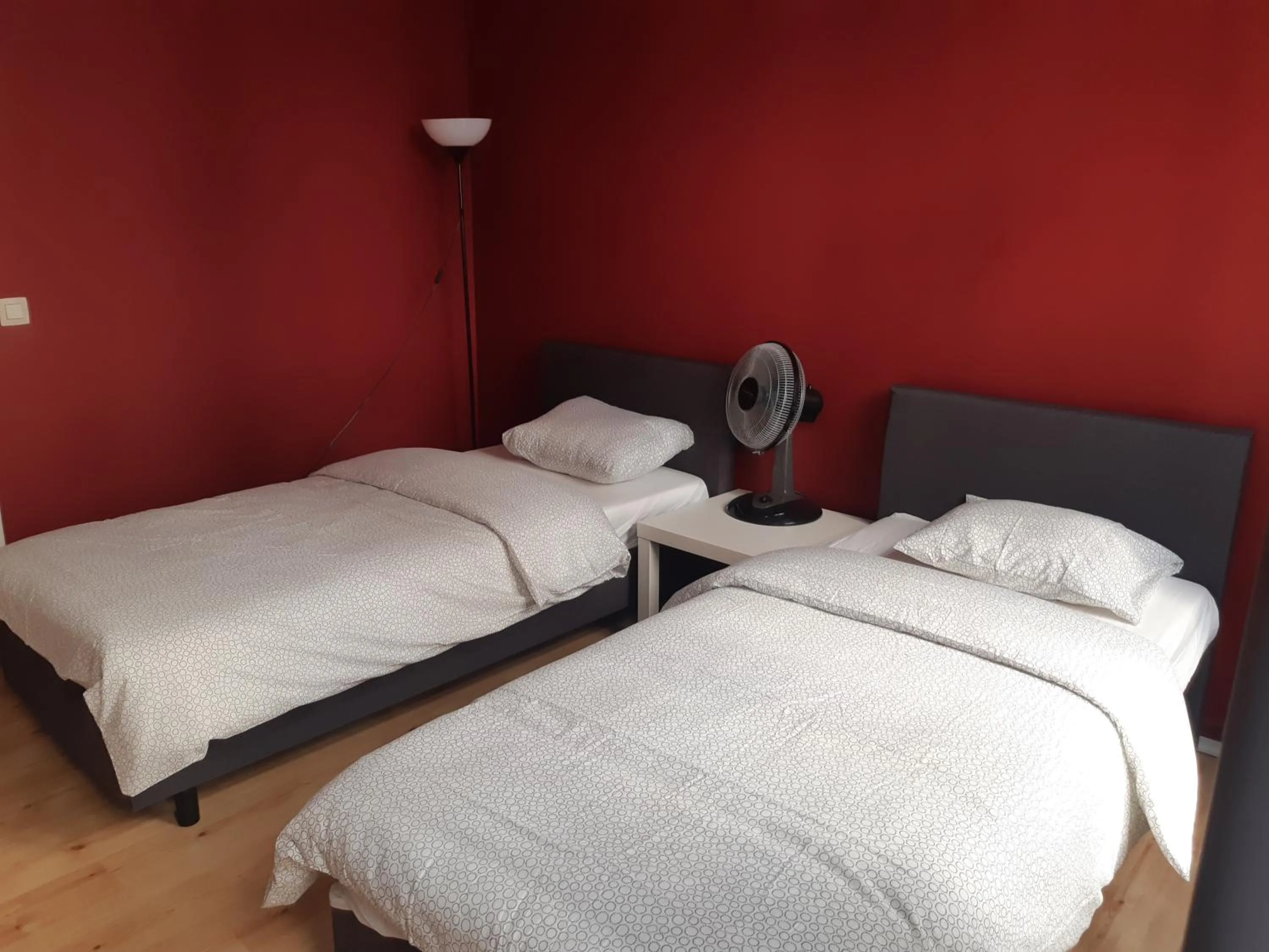 Bed in Rentbynight Aparthotel